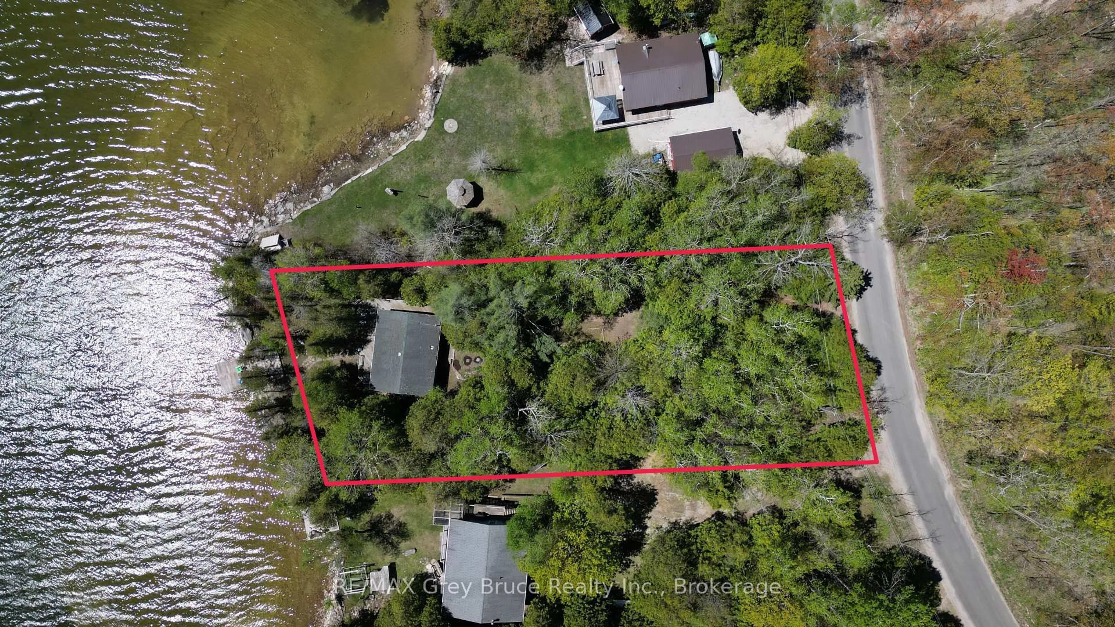 A pic from outside/outdoor area/front of a property/back of a property/a pic from drone, street for 282 Barney's Blvd, Northern Bruce Peninsula Ontario N0H 1Z0