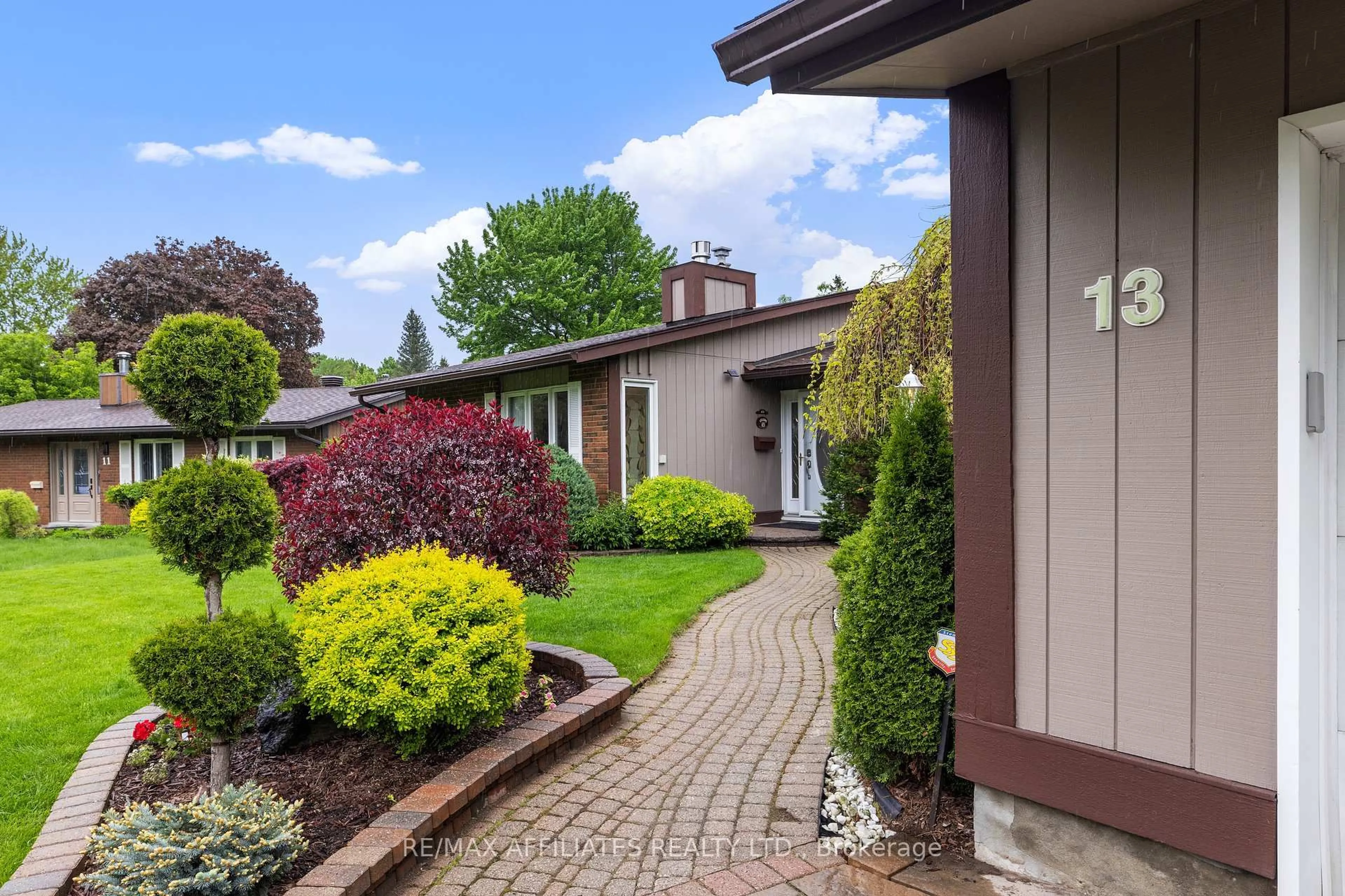Home with brick exterior material, street for 13 Amundsen Cres, Ottawa Ontario K2L 1A6