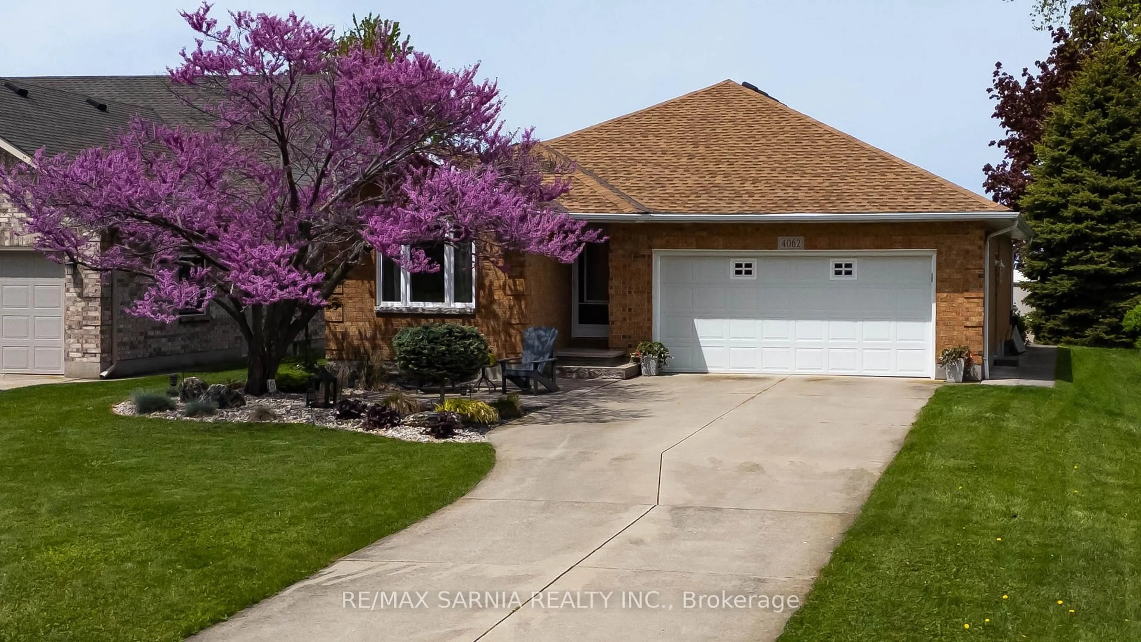Home with vinyl exterior material, street for 4062 Bluepoint Dr, Plympton-Wyoming Ontario N0N 1J0