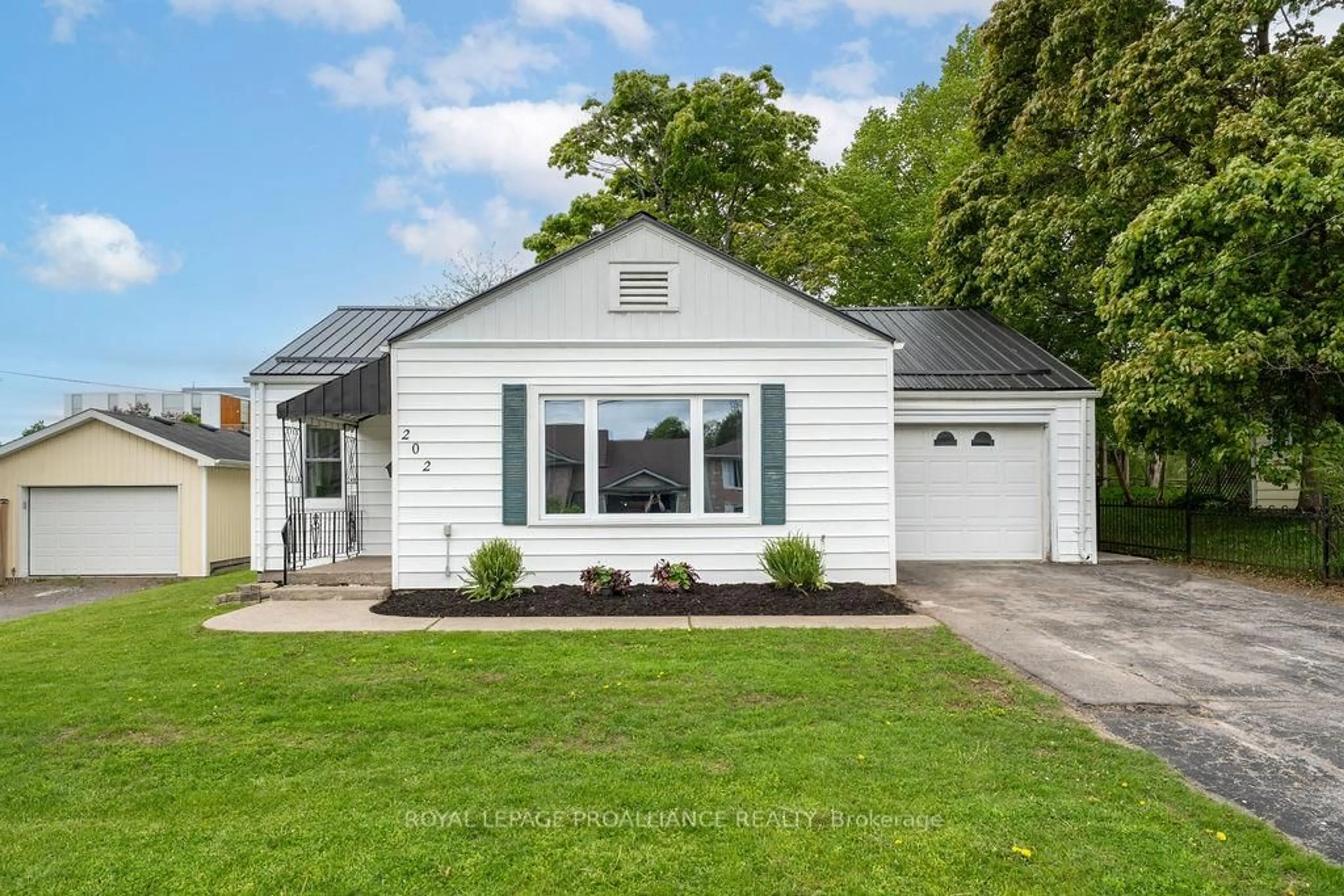 Home with vinyl exterior material, street for 202 Maclellan Ave, Quinte West Ontario K8V 5J4