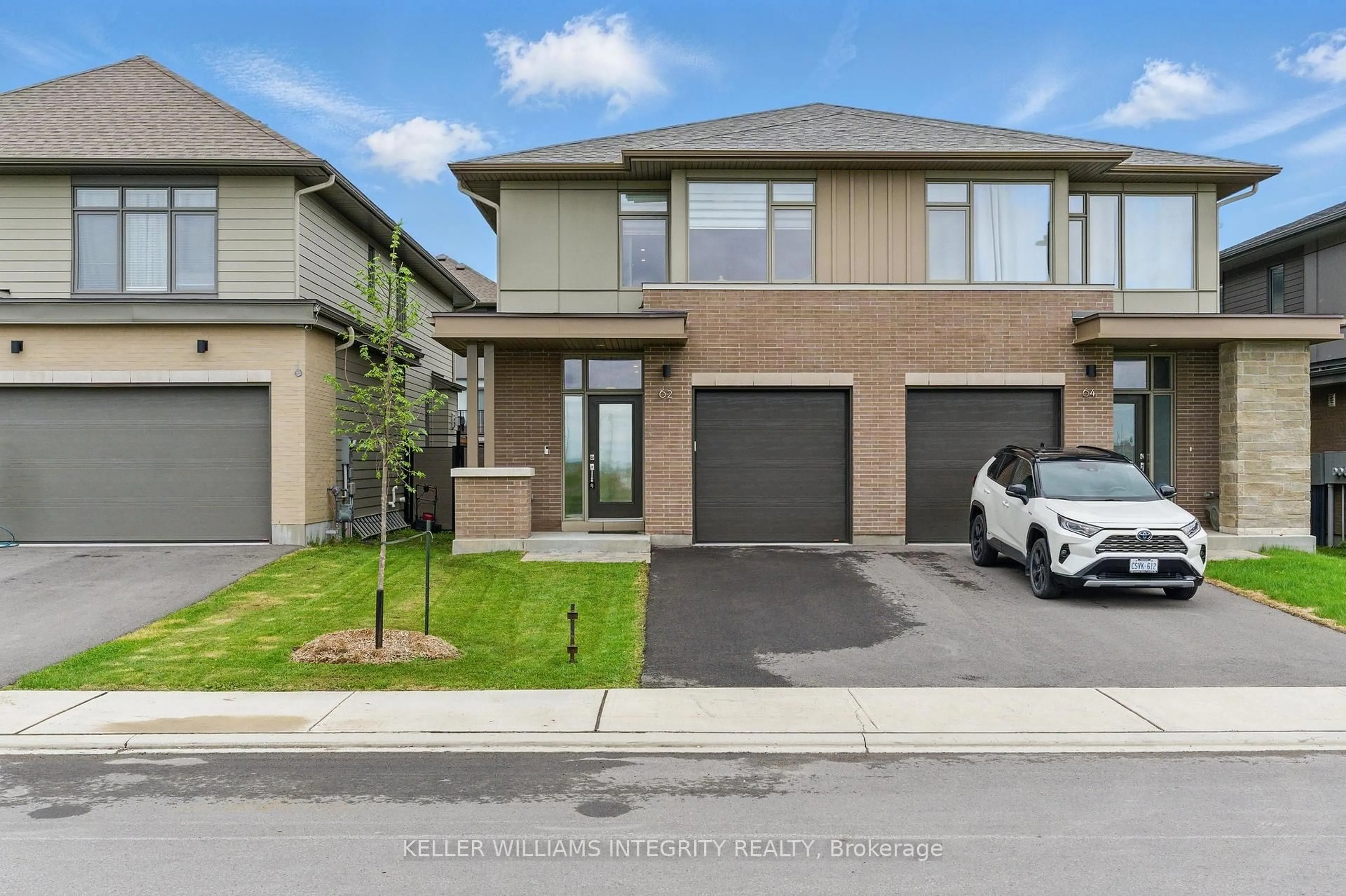 A pic from outside/outdoor area/front of a property/back of a property/a pic from drone, street for 62 Michael Stoqua St, Ottawa Ontario K1K 5A2