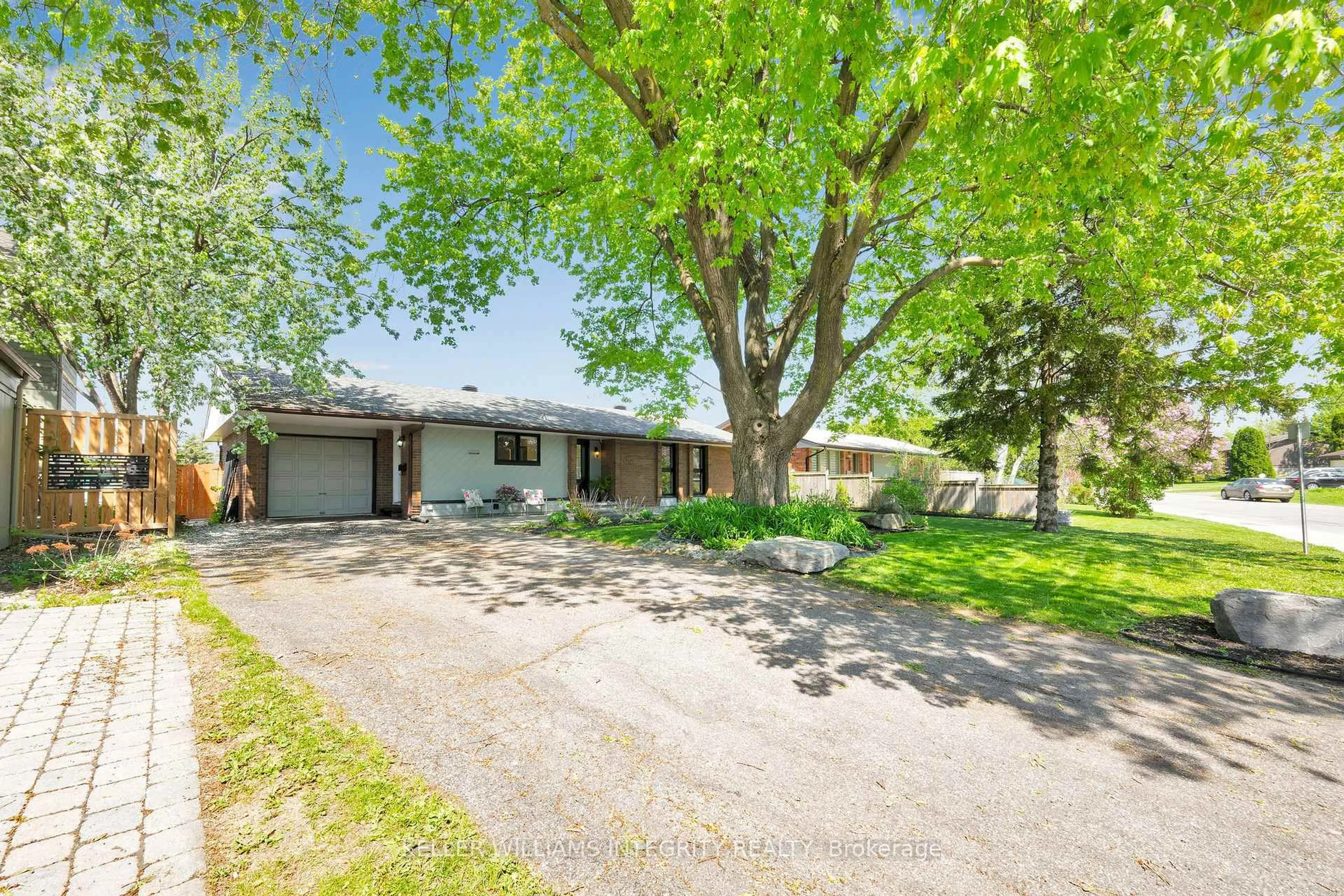 A pic from outside/outdoor area/front of a property/back of a property/a pic from drone, street for 203 Penfield Dr, Ottawa Ontario K2K 1M8