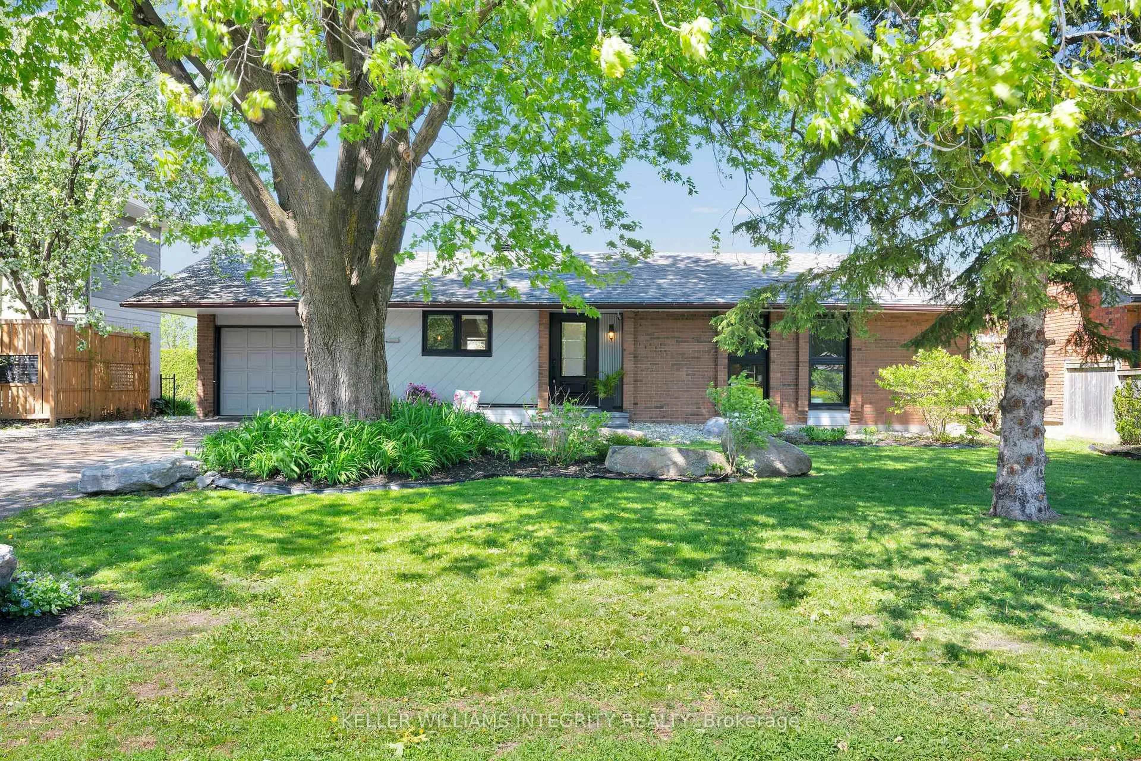 Home with brick exterior material, street for 203 Penfield Dr, Ottawa Ontario K2K 1M8