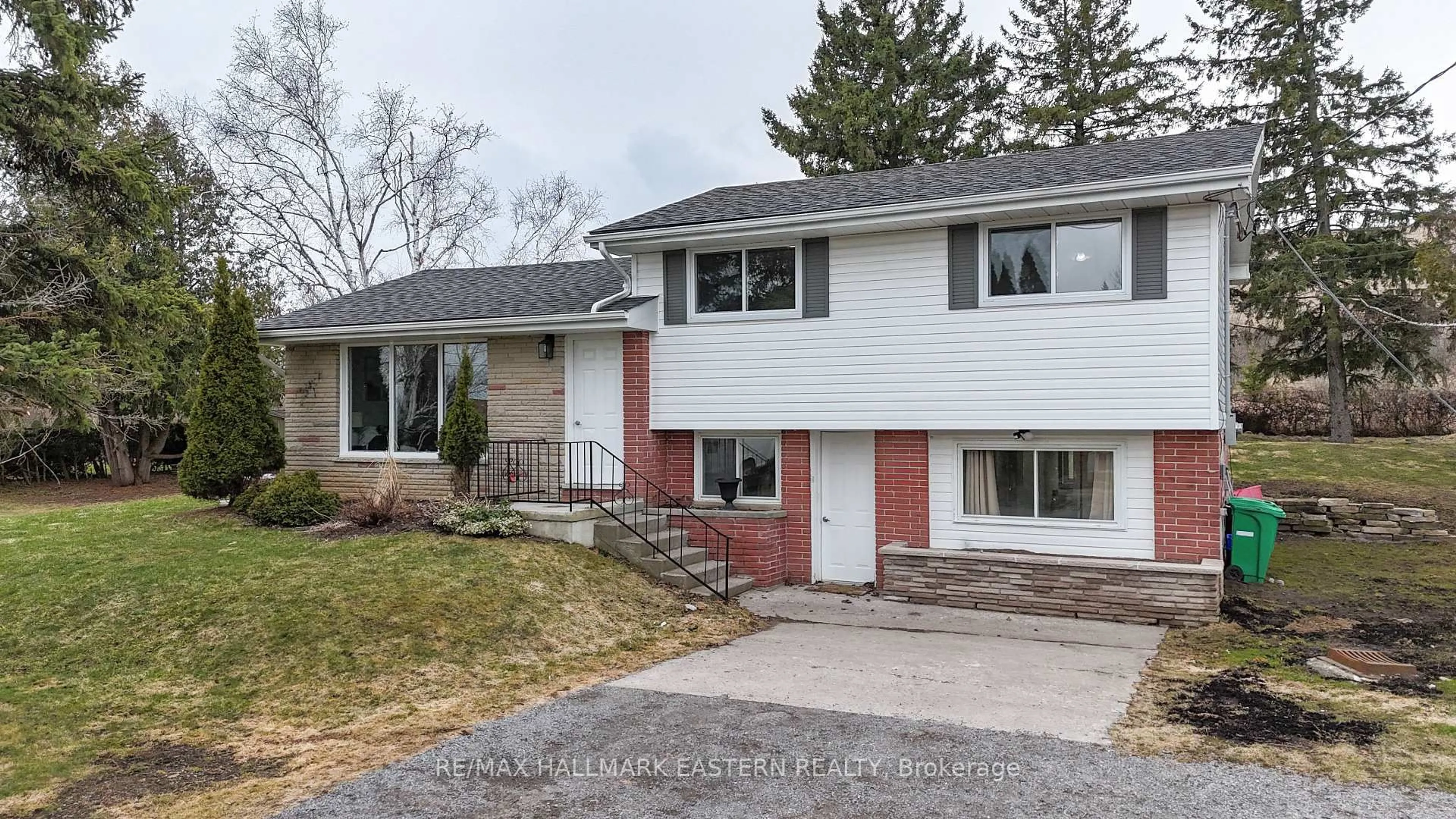 Home with vinyl exterior material, street for 204 Hillview Dr, Peterborough North Ontario K9K 2N2