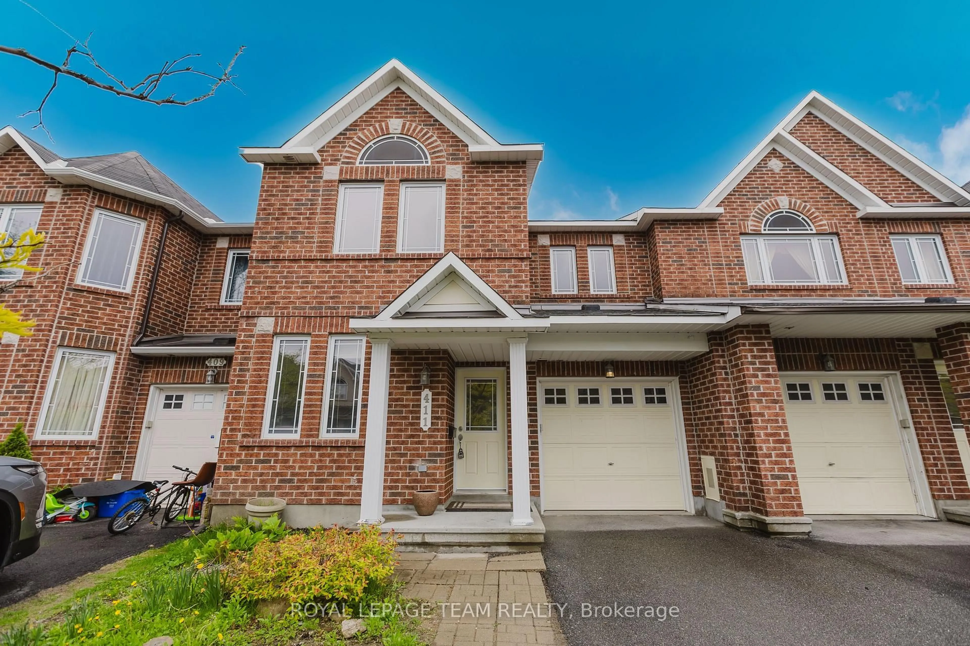 Home with brick exterior material, street for 411 Temiskaming Cres, Ottawa Ontario K2J 0V4