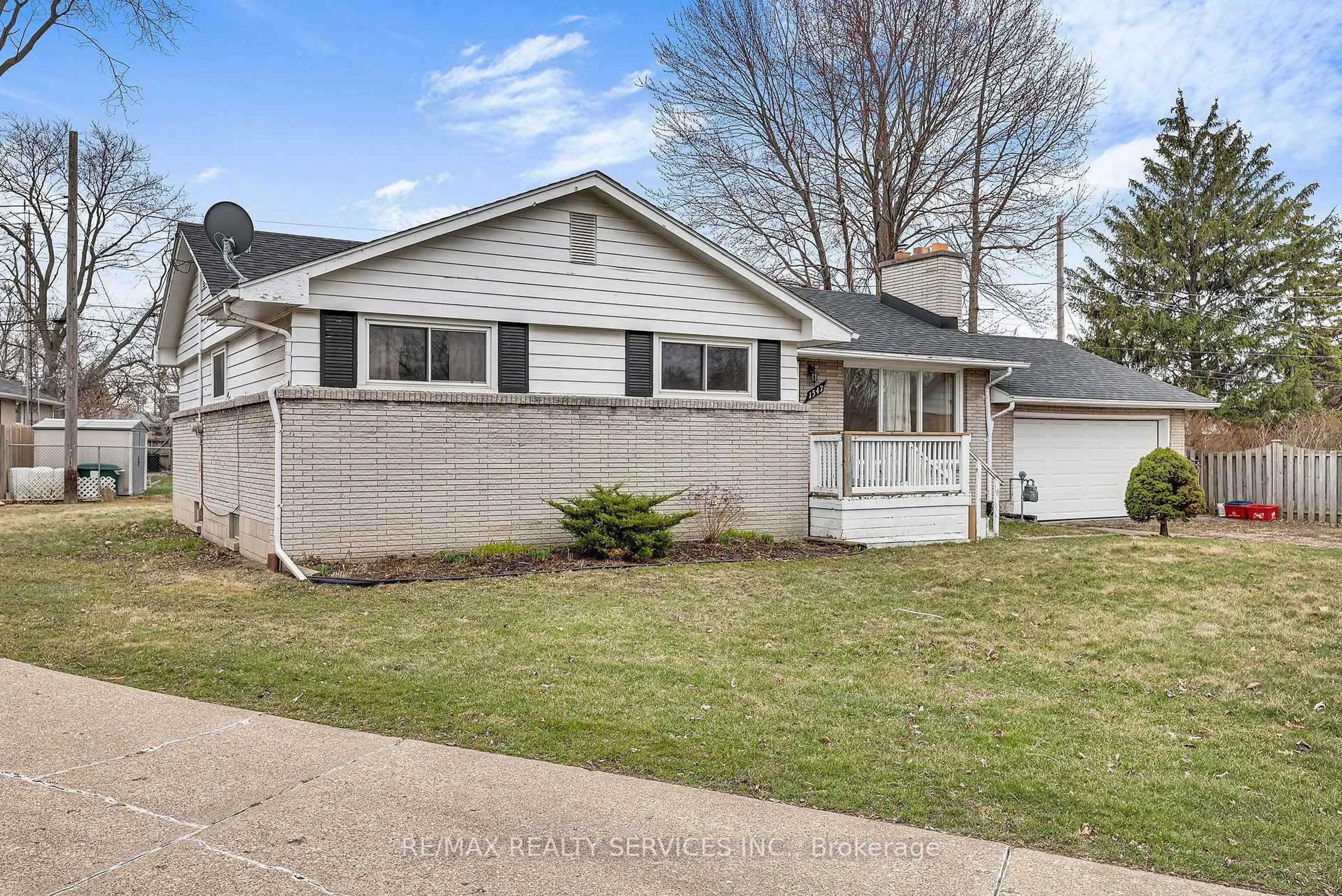 Home with vinyl exterior material, street for 1547 Cherrylawn Cres, Windsor Ontario N9E 1P3