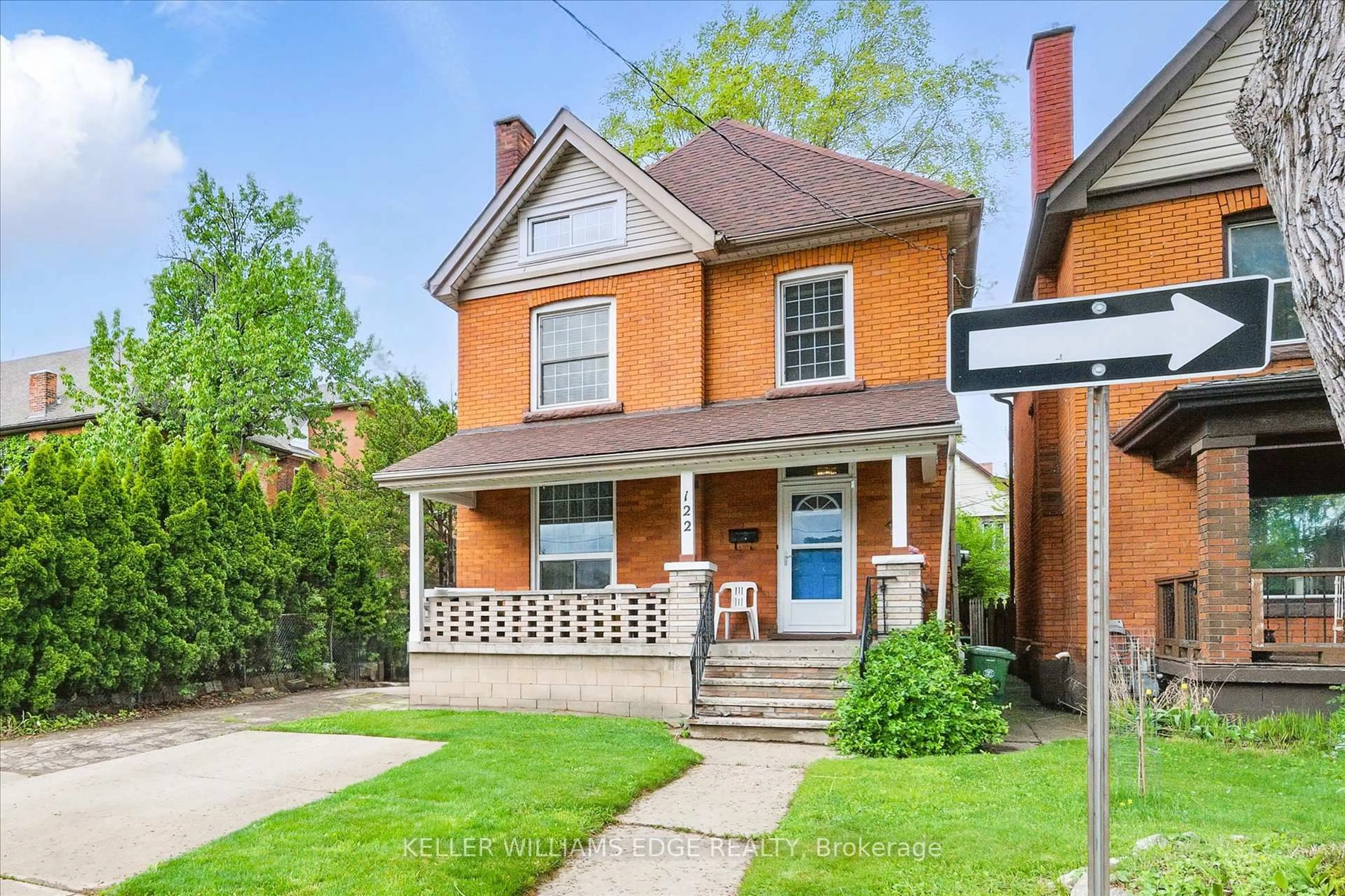 Home with brick exterior material, street for 122 Sanford Ave, Hamilton Ontario L8M 2G8