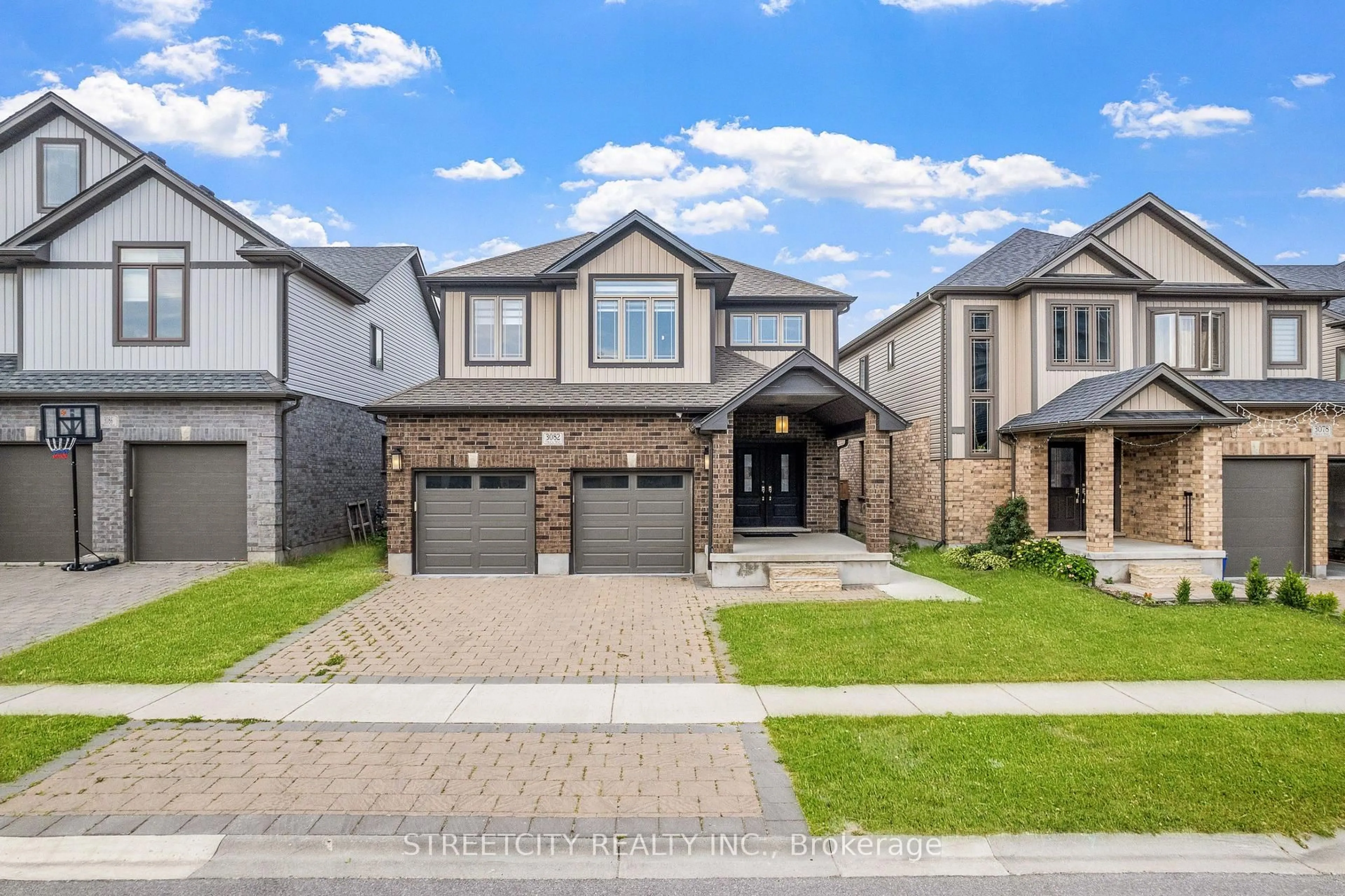 Home with brick exterior material, street for 3082 Tokala Tr, London North Ontario N6G 0S7