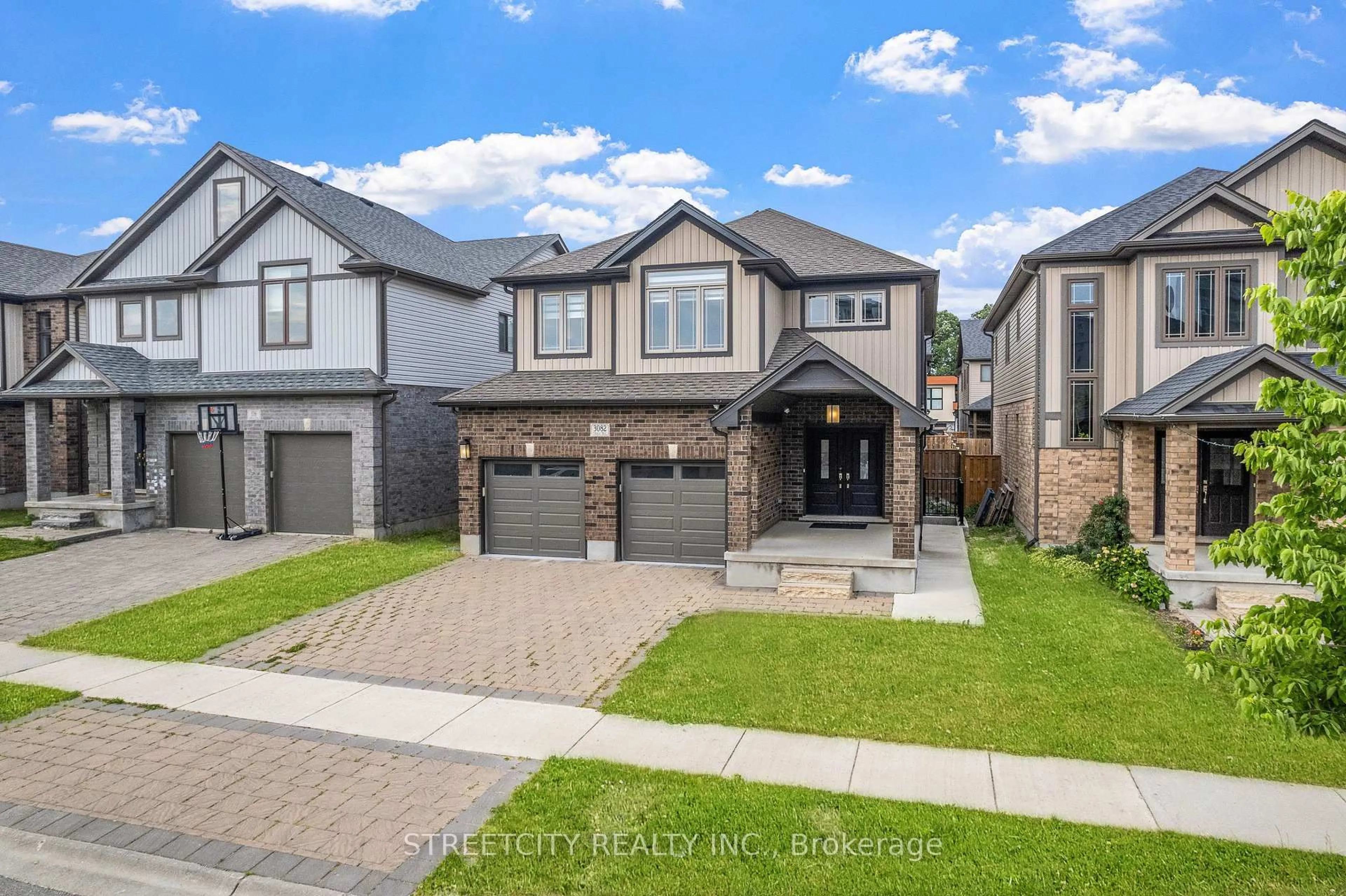 Home with brick exterior material, street for 3082 Tokala Tr, London North Ontario N6G 0S7