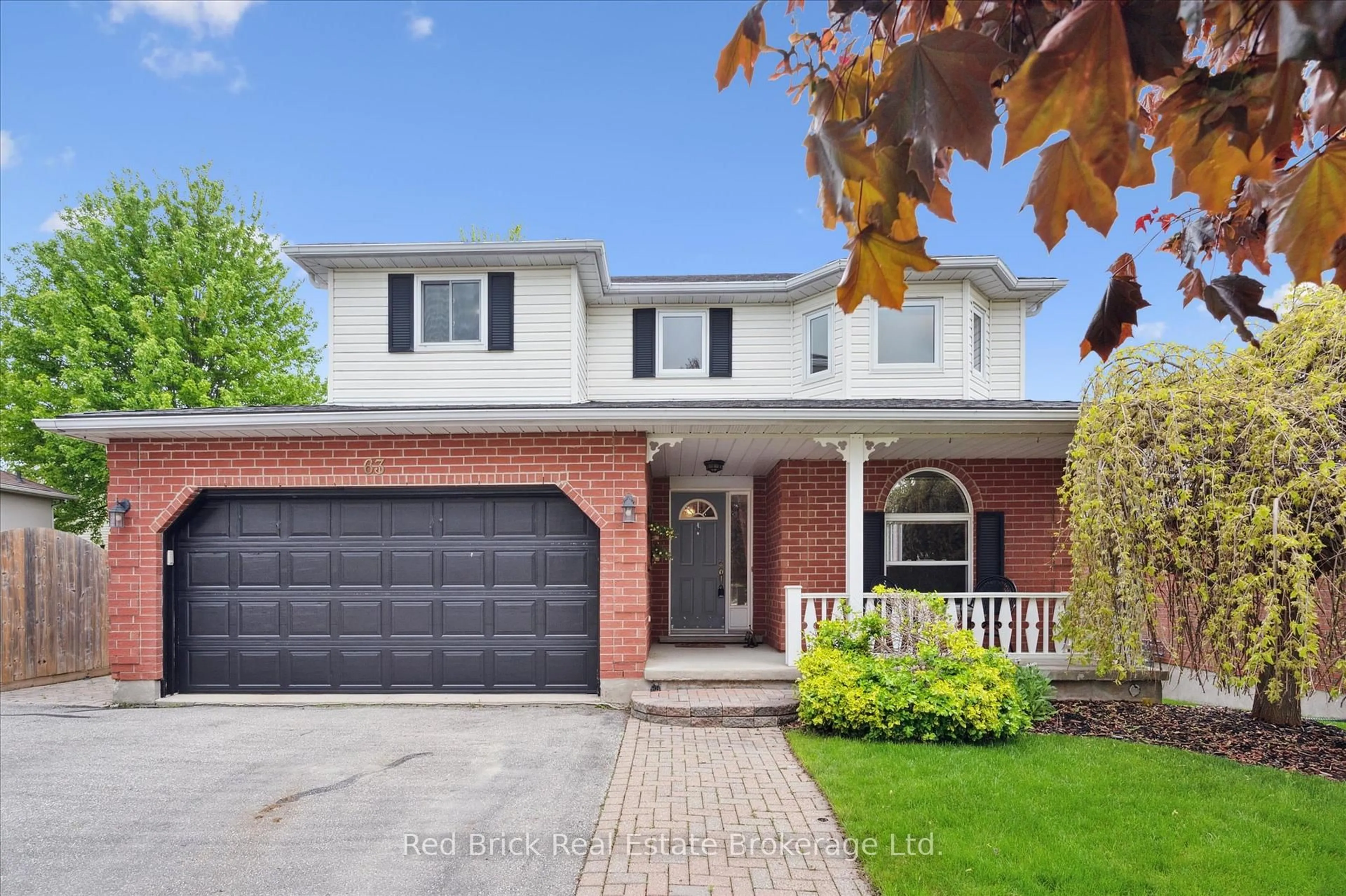Home with brick exterior material, street for 63 Flaherty Dr, Guelph Ontario N1H 8K6