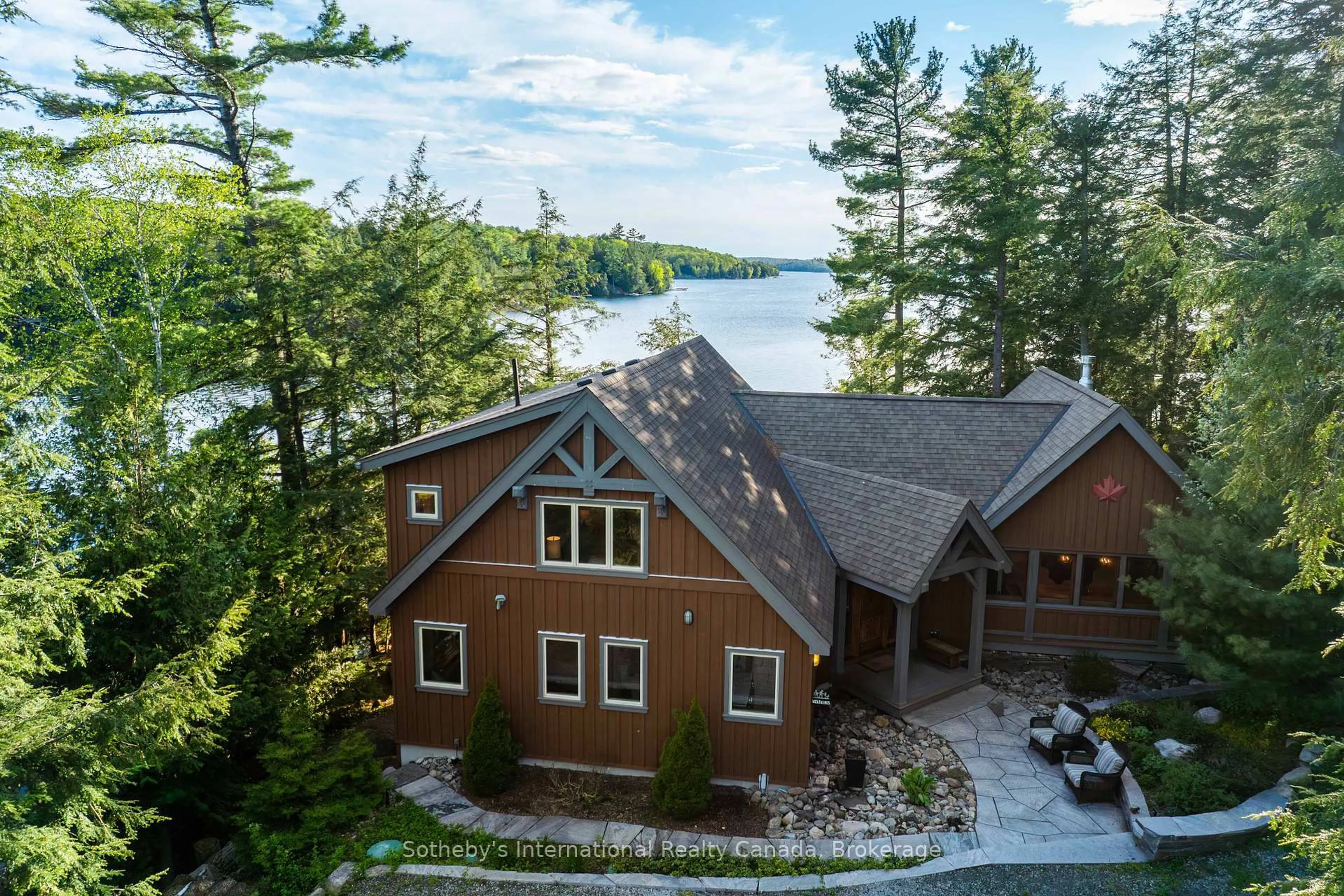 A pic from outside/outdoor area/front of a property/back of a property/a pic from drone, water/lake/river/ocean view for 1075 Elmhurst Lane, Dysart et al Ontario K0M 1S0