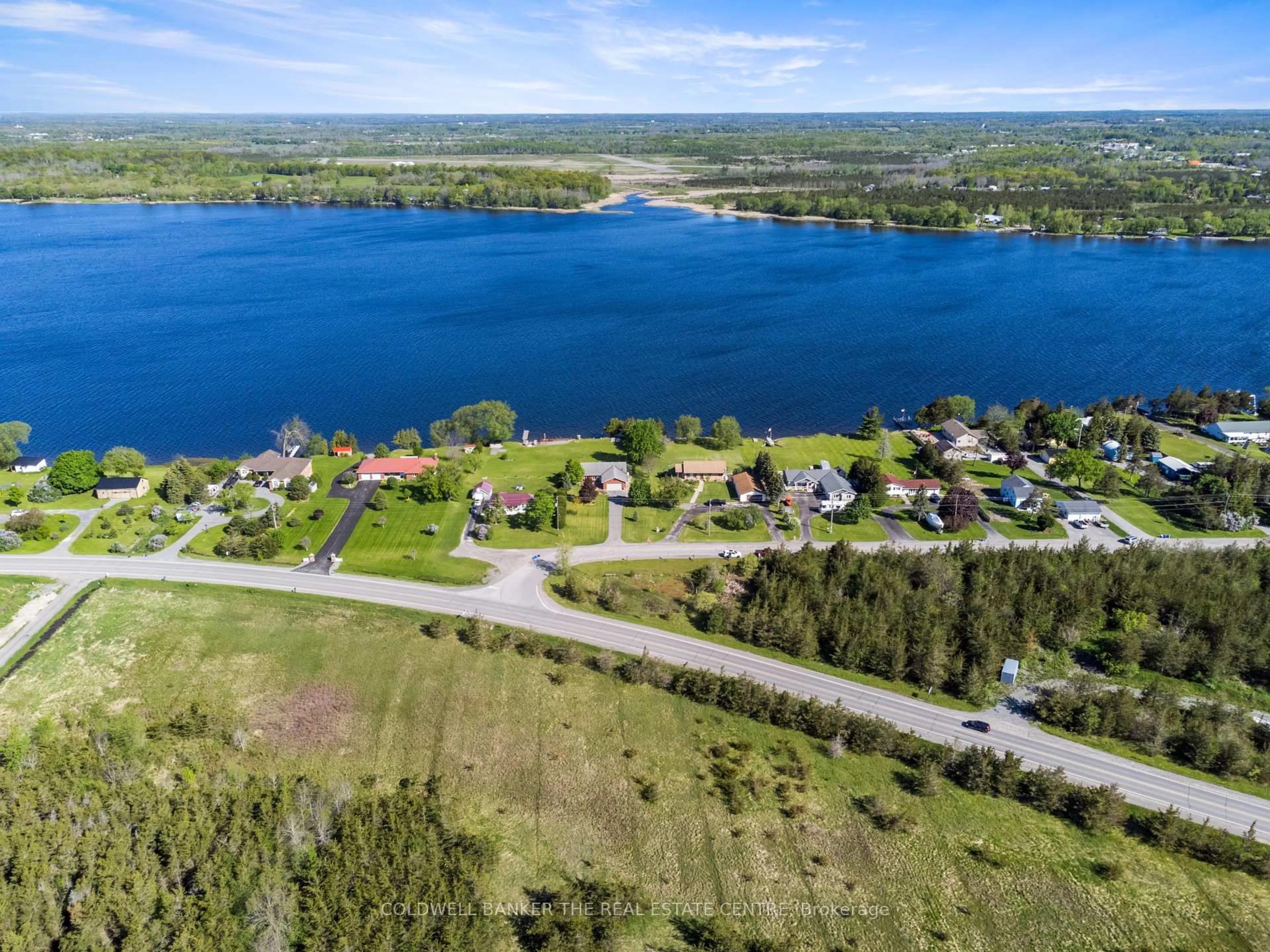 A pic from outside/outdoor area/front of a property/back of a property/a pic from drone, water/lake/river/ocean view for 1530 County Rd 35, Prince Edward County Ontario K0K 2T0