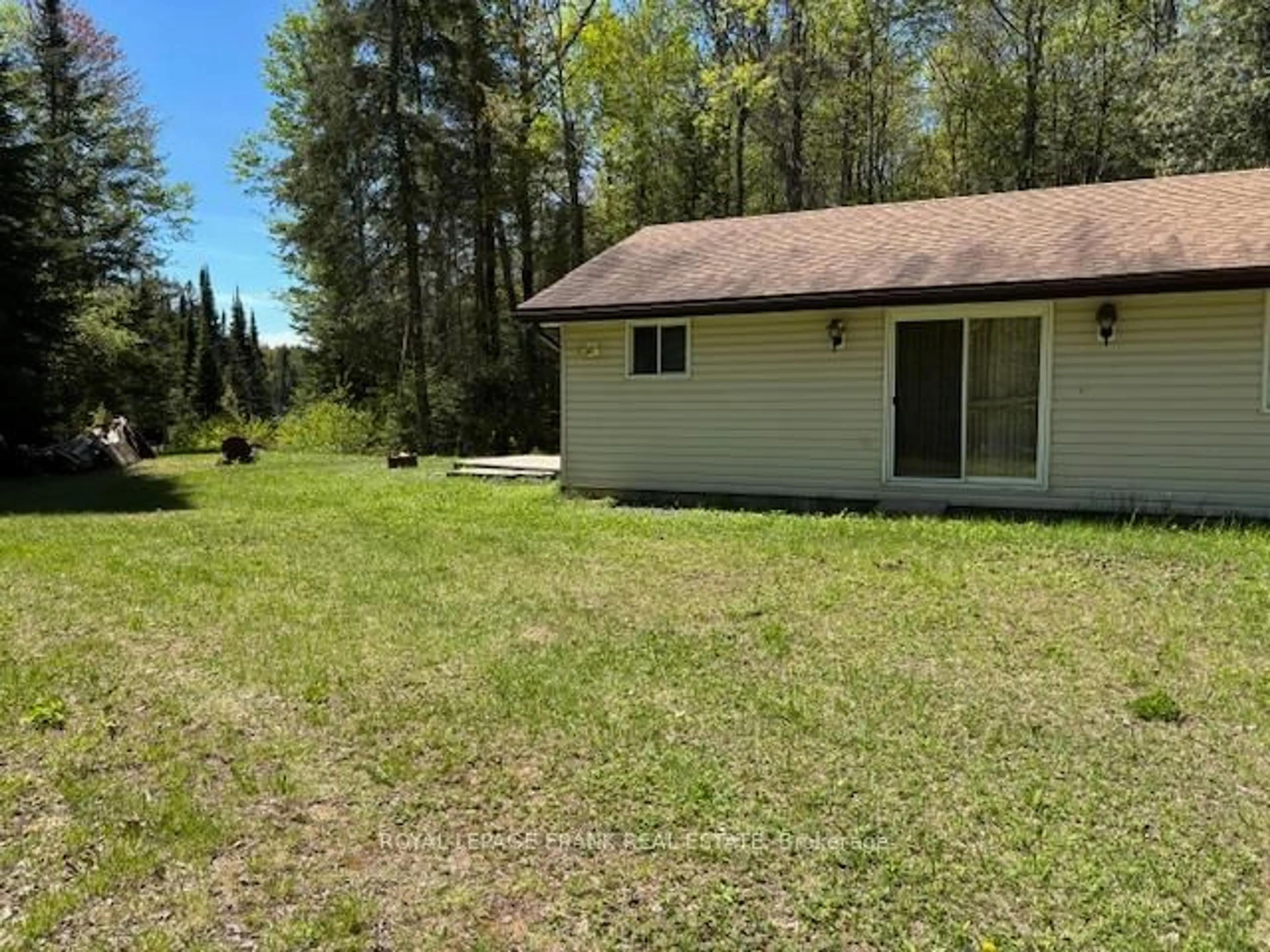 A pic from outside/outdoor area/front of a property/back of a property/a pic from drone, forest/trees view for 807 Airport Rd, Bancroft Ontario K0L 1C0