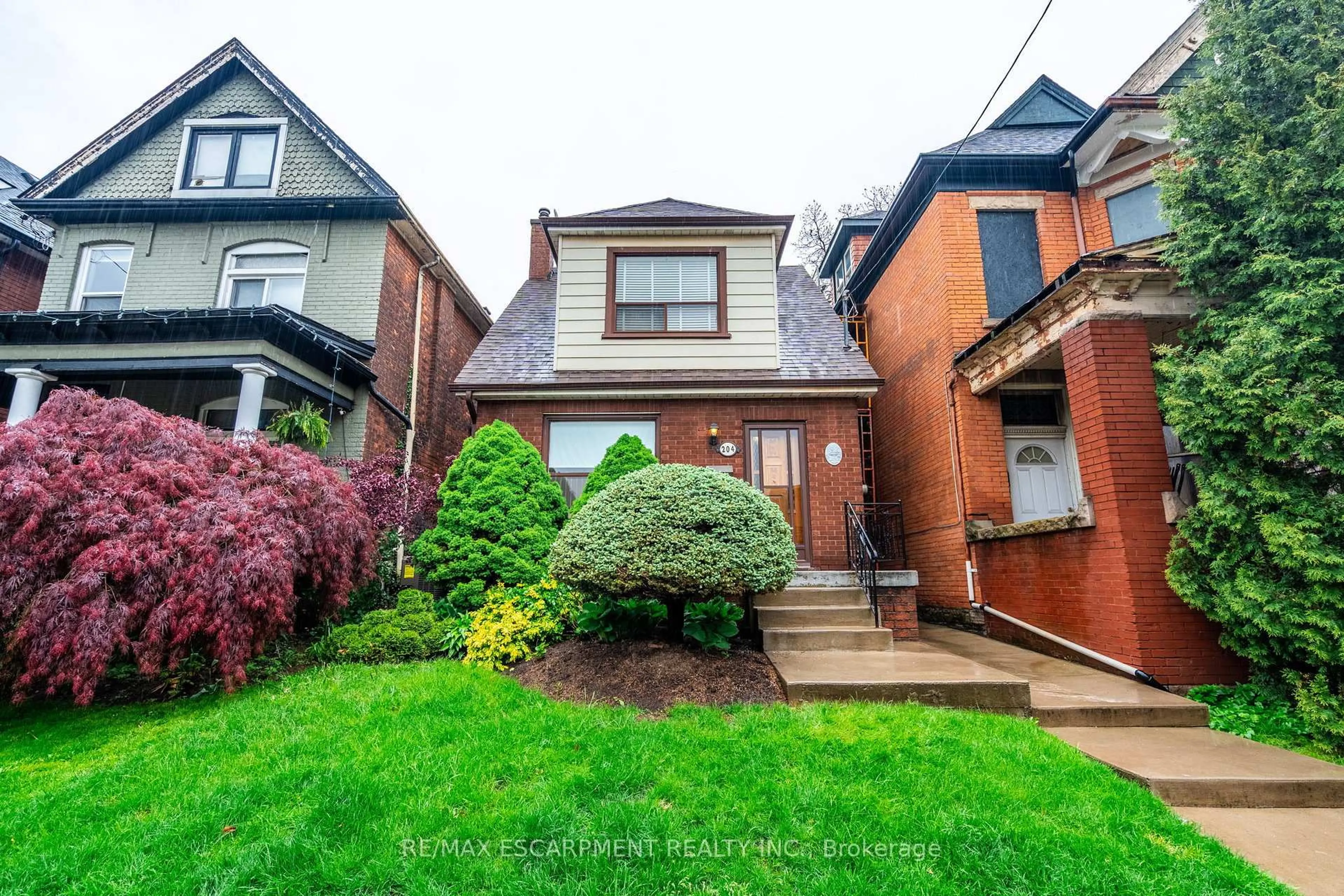 Home with brick exterior material, street for 204 Emerald St, Hamilton Ontario L8L 5K8