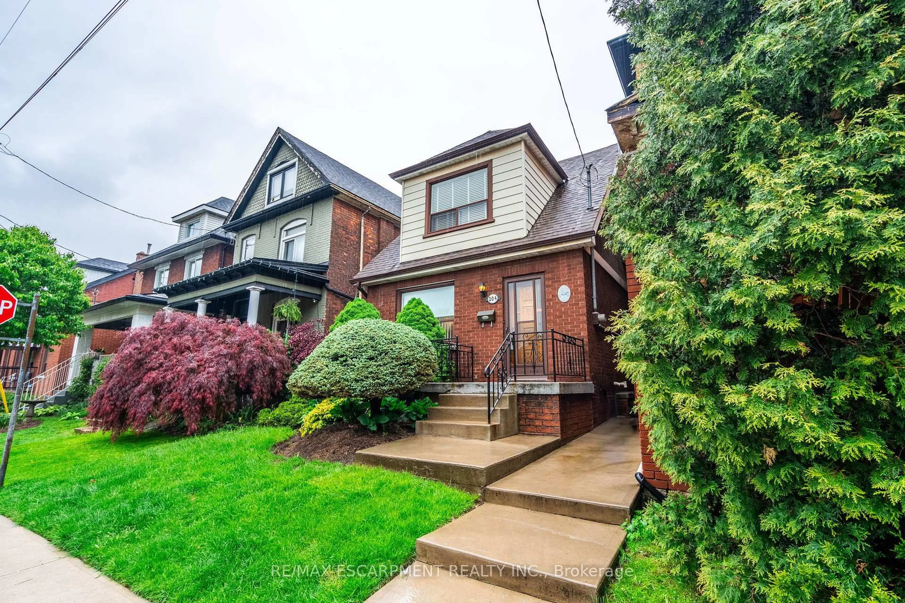 Home with brick exterior material, street for 204 Emerald St, Hamilton Ontario L8L 5K8