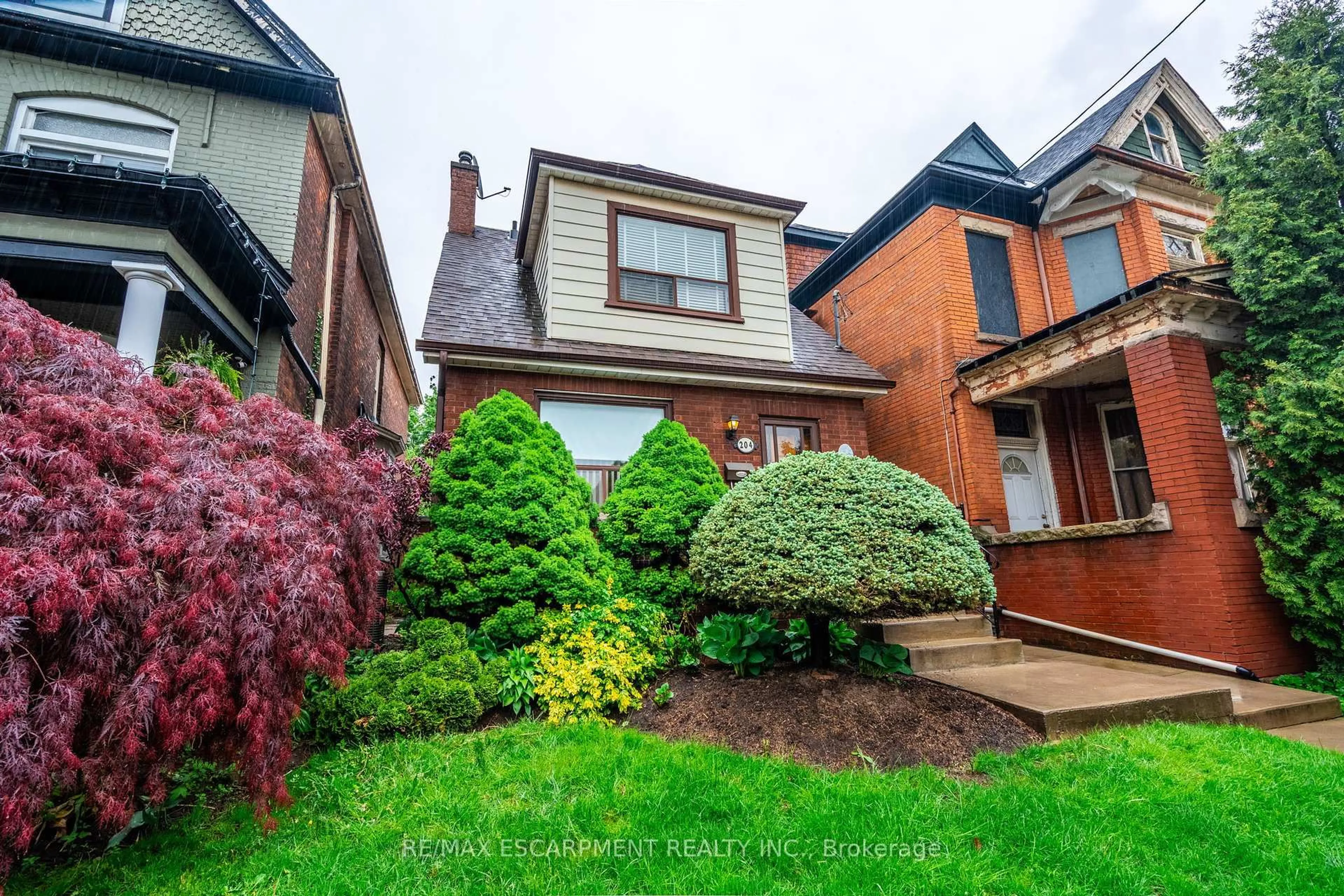Home with brick exterior material, street for 204 Emerald St, Hamilton Ontario L8L 5K8