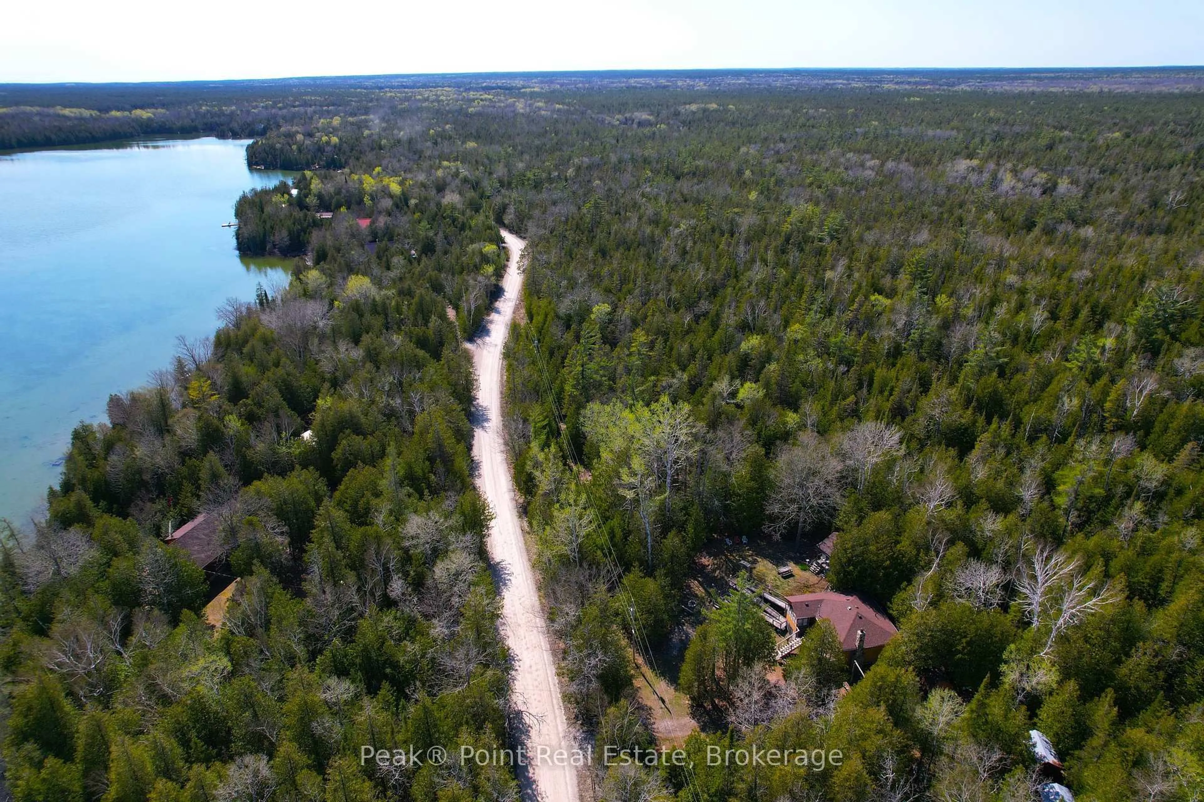 A pic from outside/outdoor area/front of a property/back of a property/a pic from drone, water/lake/river/ocean view for 152 Shouldice Lake Rd, Northern Bruce Peninsula Ontario N0H 1A0