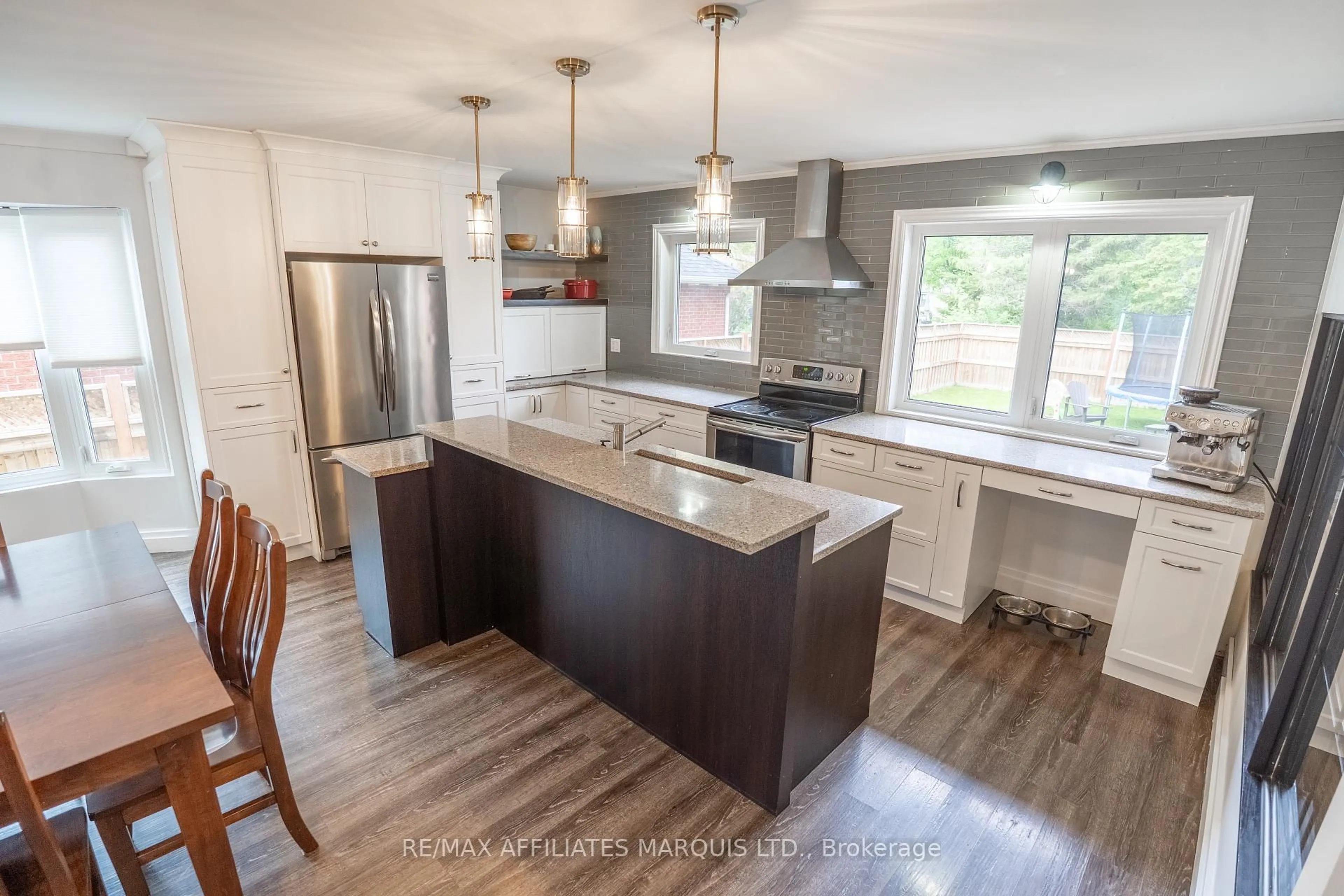 Open concept kitchen, wood/laminate floor for 1143 Stokes Dr, Cornwall Ontario K6J 5J6