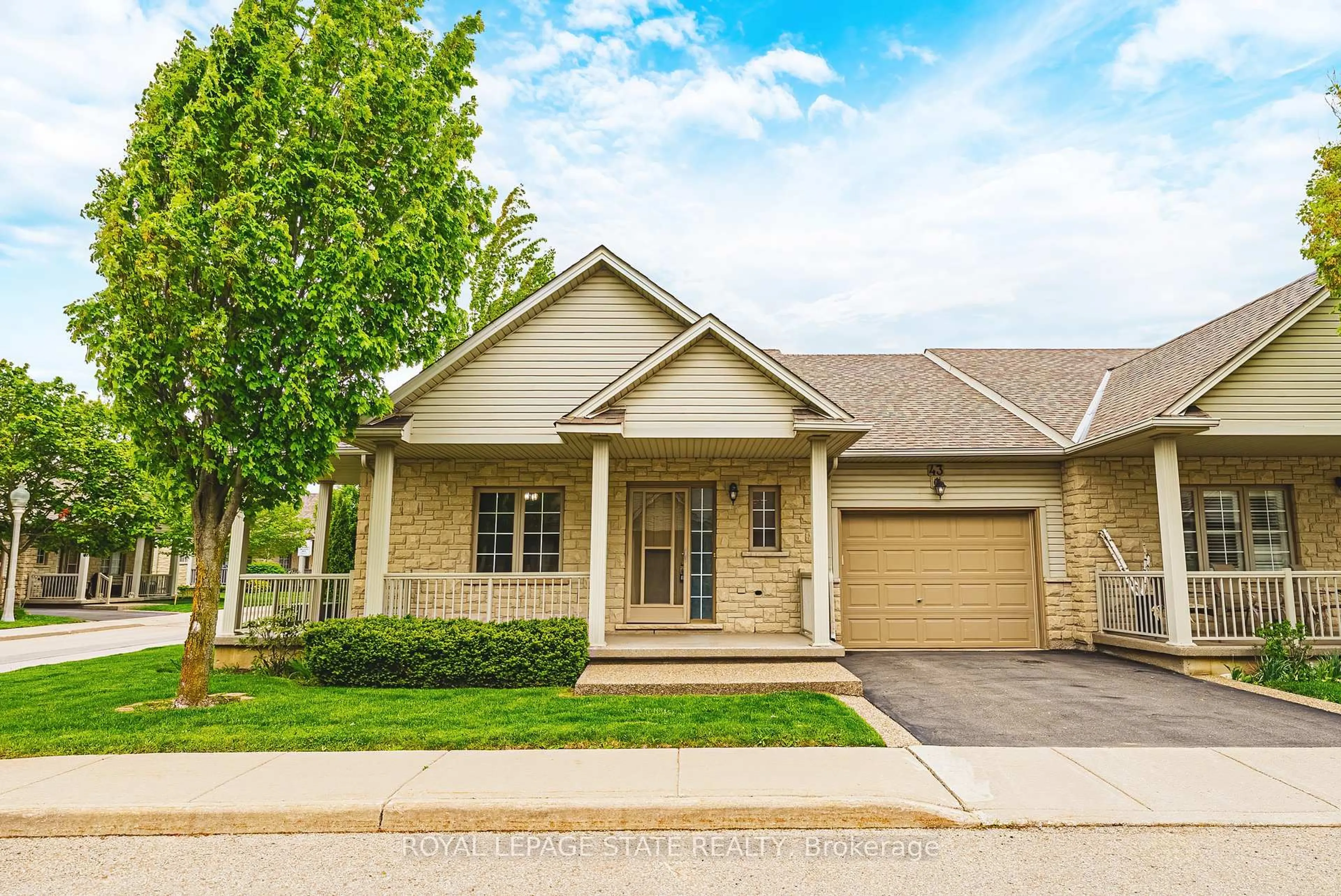 Home with brick exterior material, street for 130 Southbrook Dr #43, Hamilton Ontario L0R 1C0