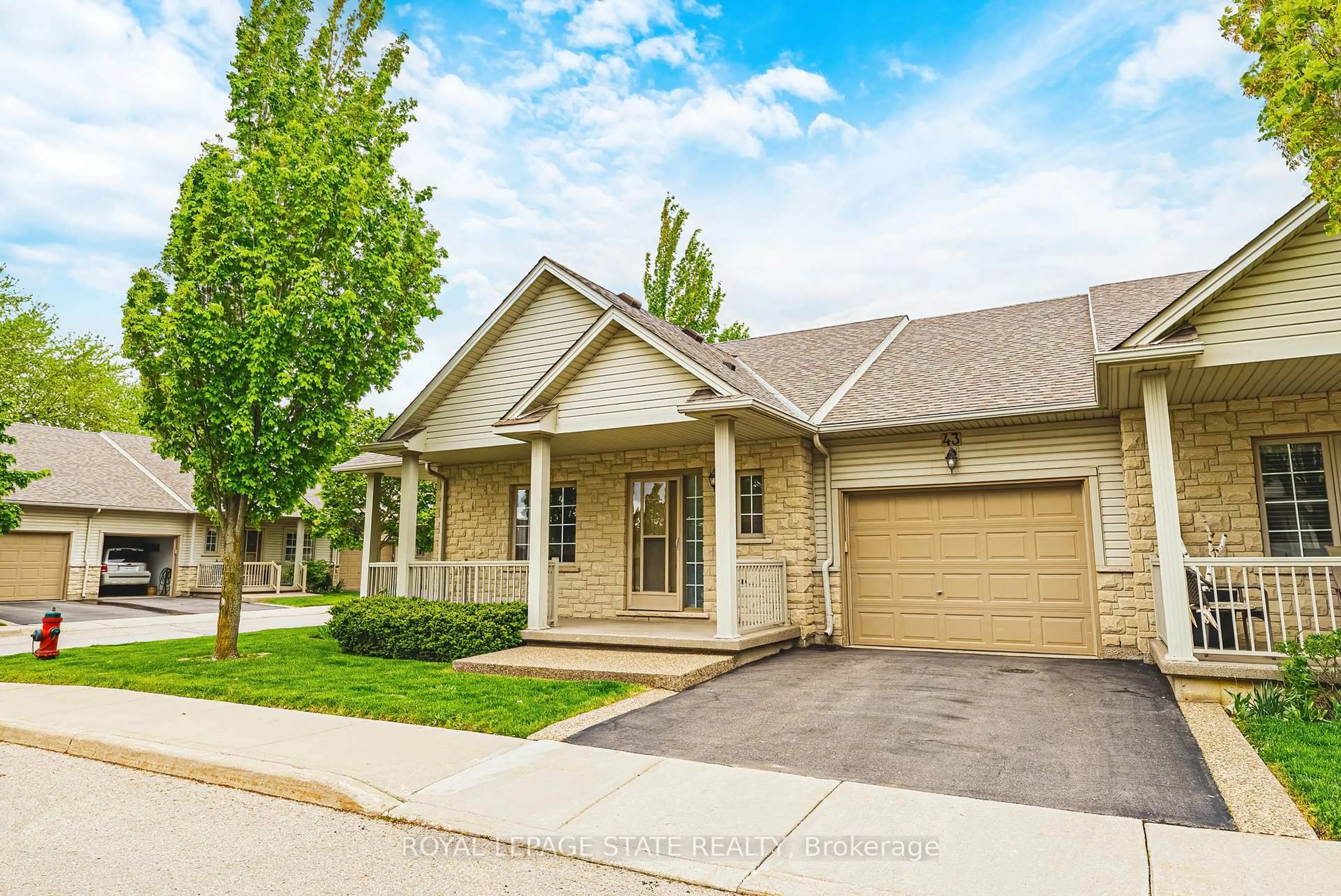 Home with brick exterior material, street for 130 Southbrook Dr #43, Hamilton Ontario L0R 1C0