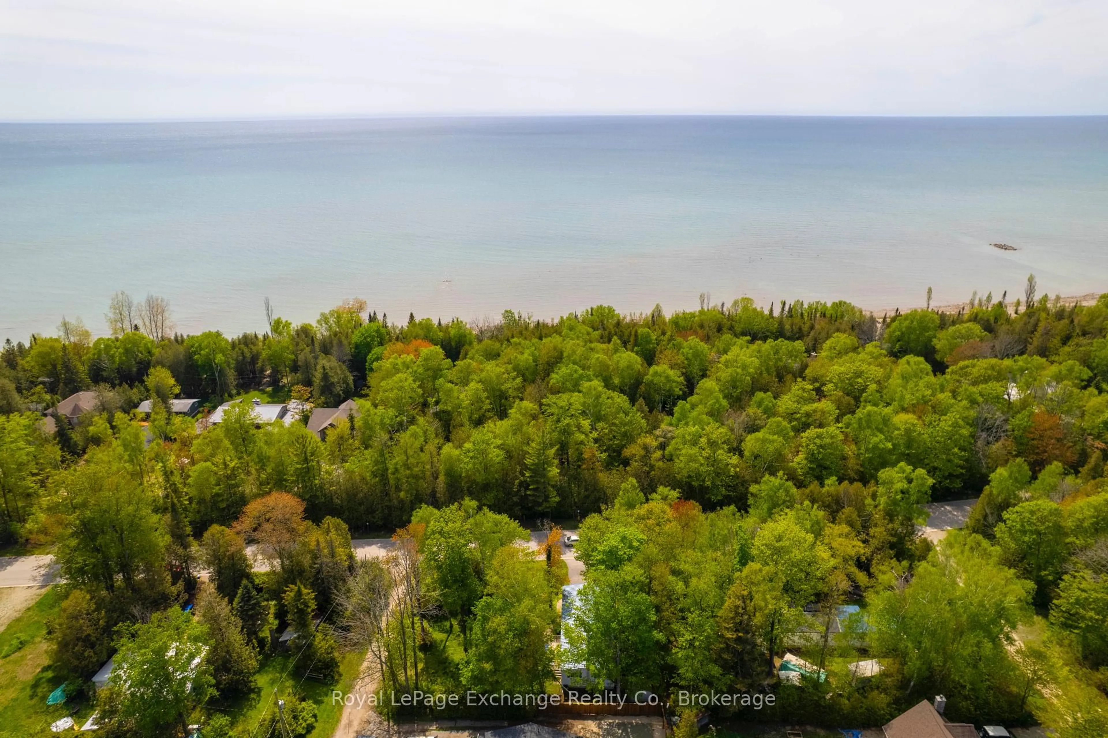 A pic from outside/outdoor area/front of a property/back of a property/a pic from drone, water/lake/river/ocean view for 112 HURON Rd, Huron-Kinloss Ontario N0G 2R0