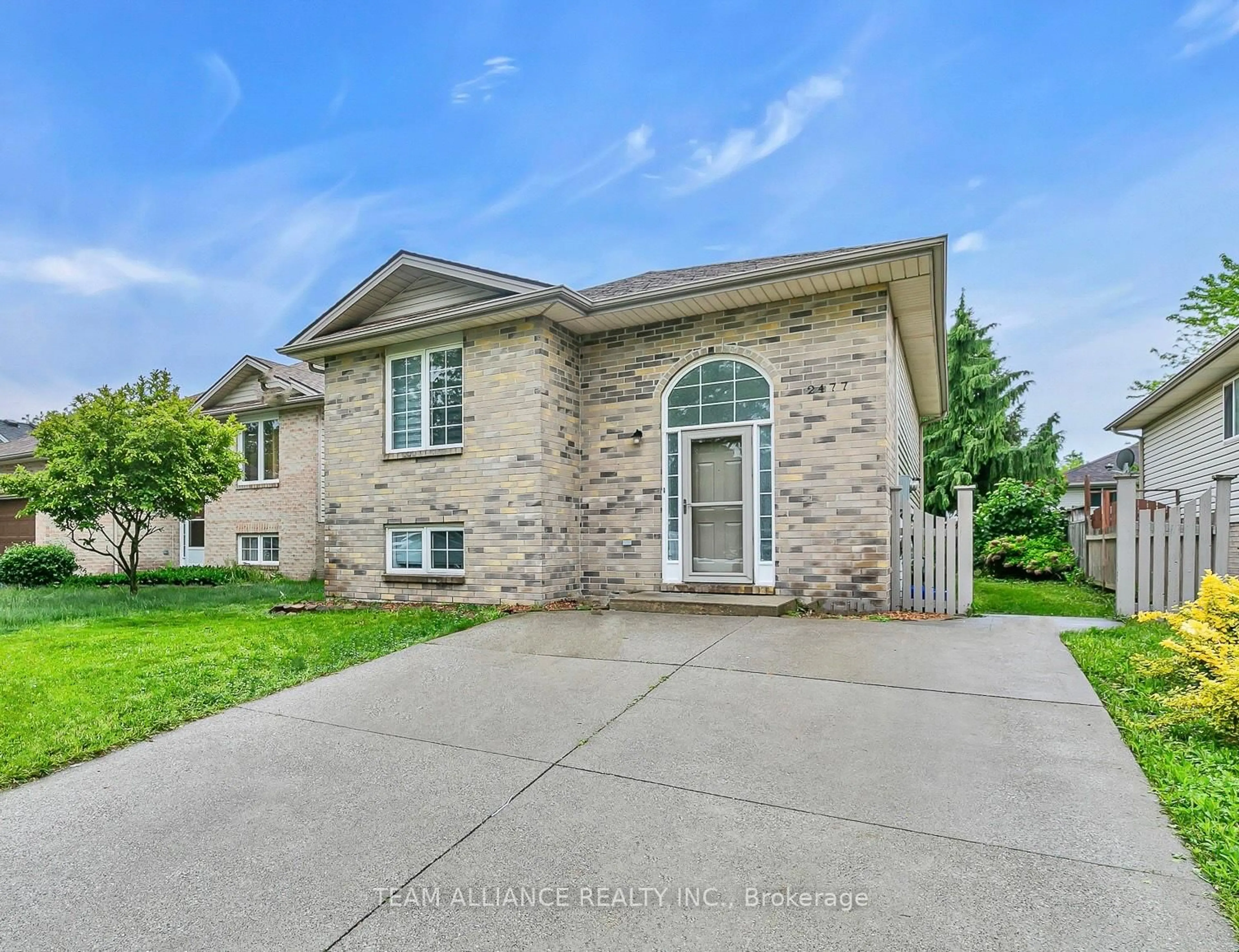 Home with brick exterior material, street for 2477 Trappers Ave, Windsor Ontario N8P 1N4