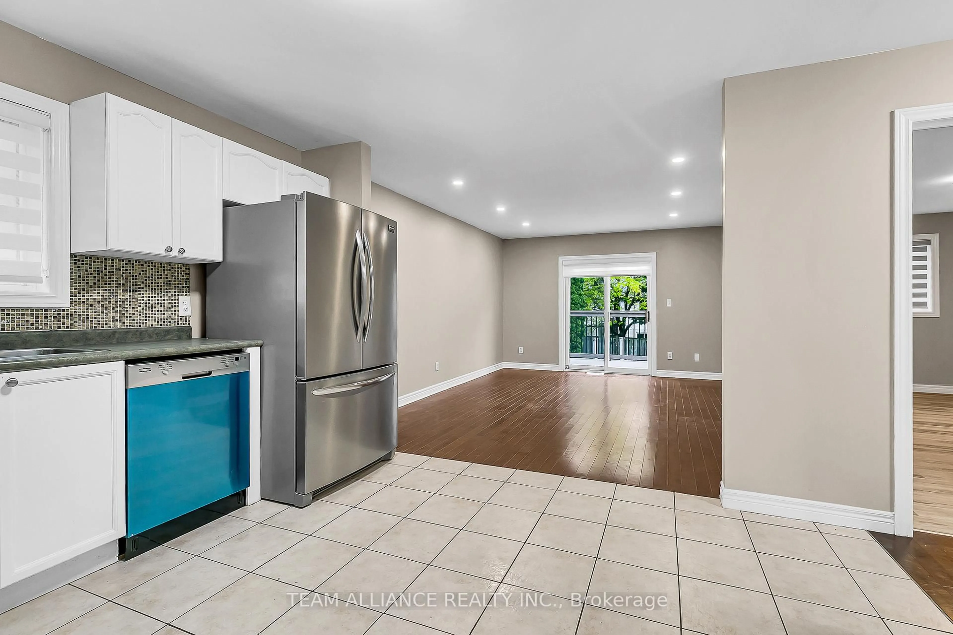 Open concept kitchen, ceramic/tile floor for 2477 Trappers Ave, Windsor Ontario N8P 1N4