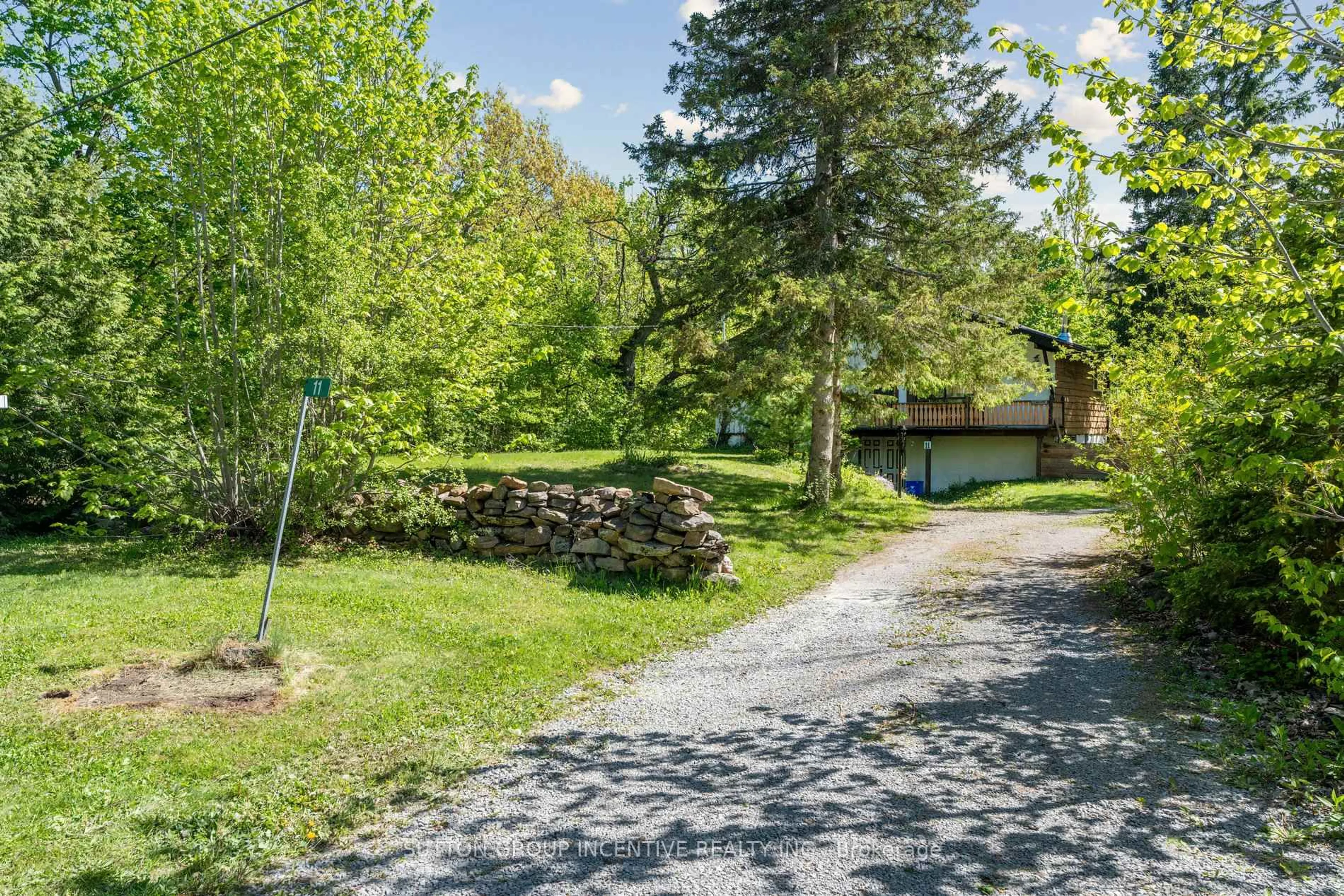 A pic from outside/outdoor area/front of a property/back of a property/a pic from drone, forest/trees view for 11 mackenzie Pl, Kawartha Lakes Ontario K0M 2B0