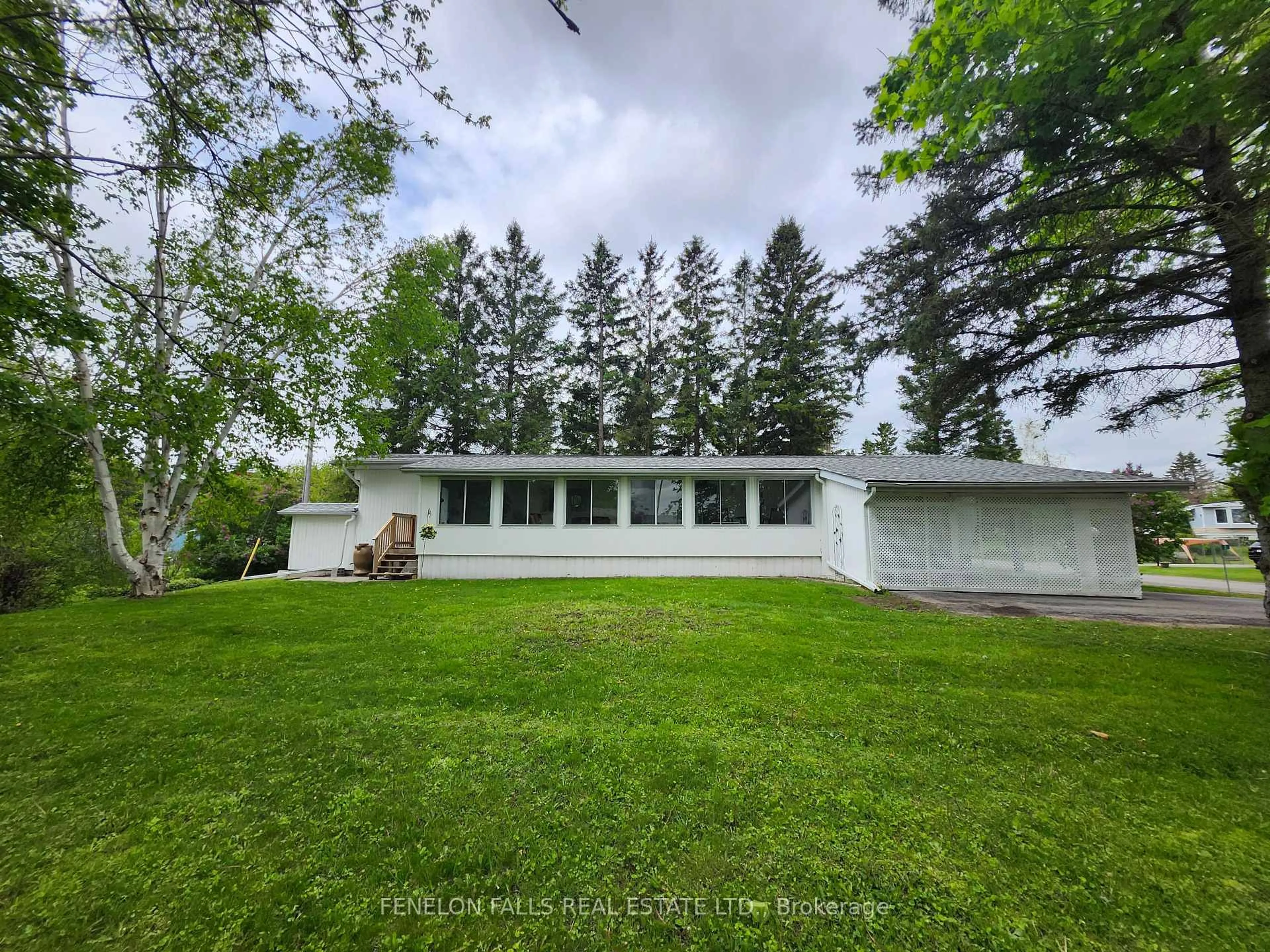 A pic from outside/outdoor area/front of a property/back of a property/a pic from drone, unknown for 2 Park Cres, Kawartha Lakes Ontario K9V 0H5