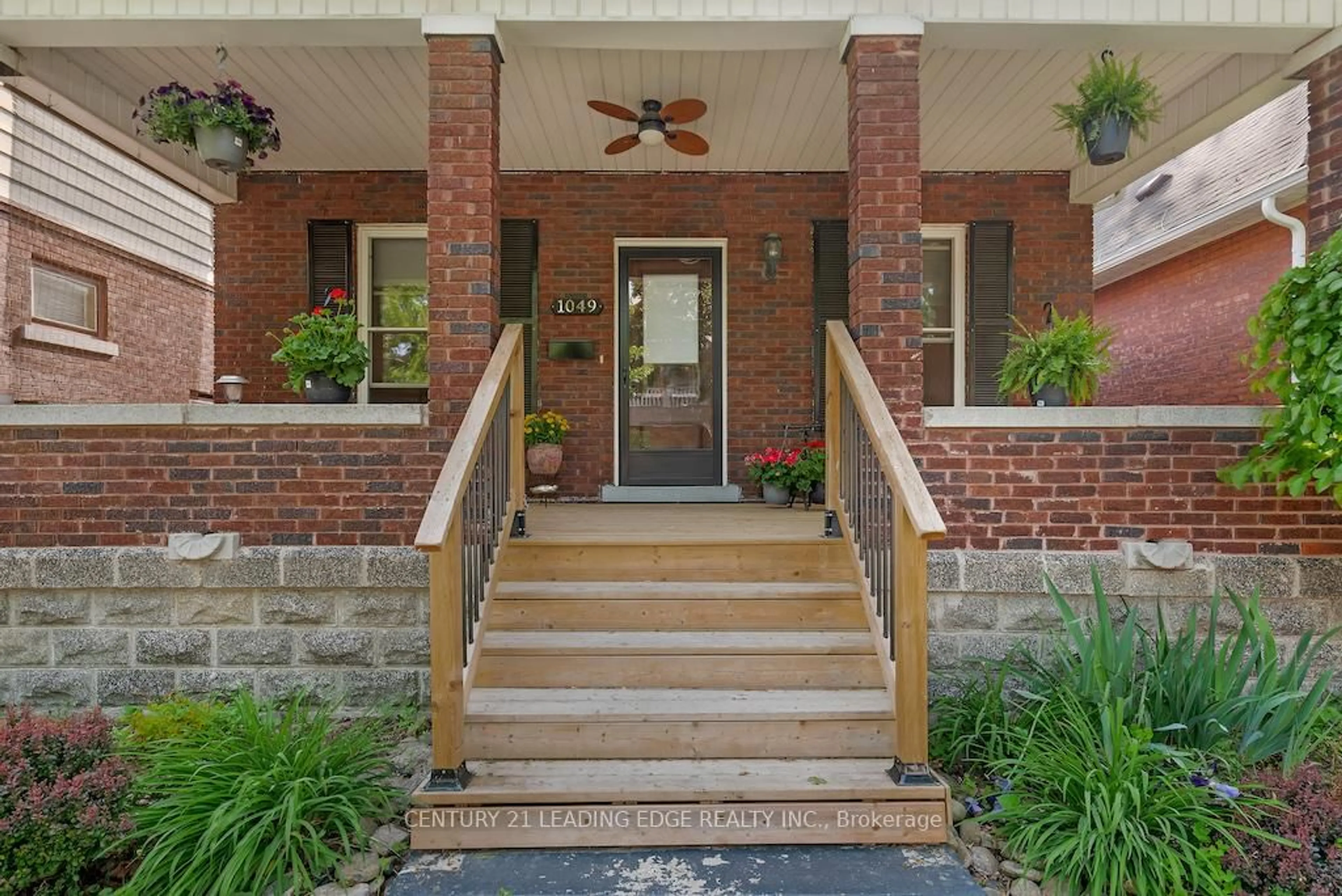 Home with brick exterior material, street for 1049 Windermere Rd, Windsor Ontario N8Y 3E5