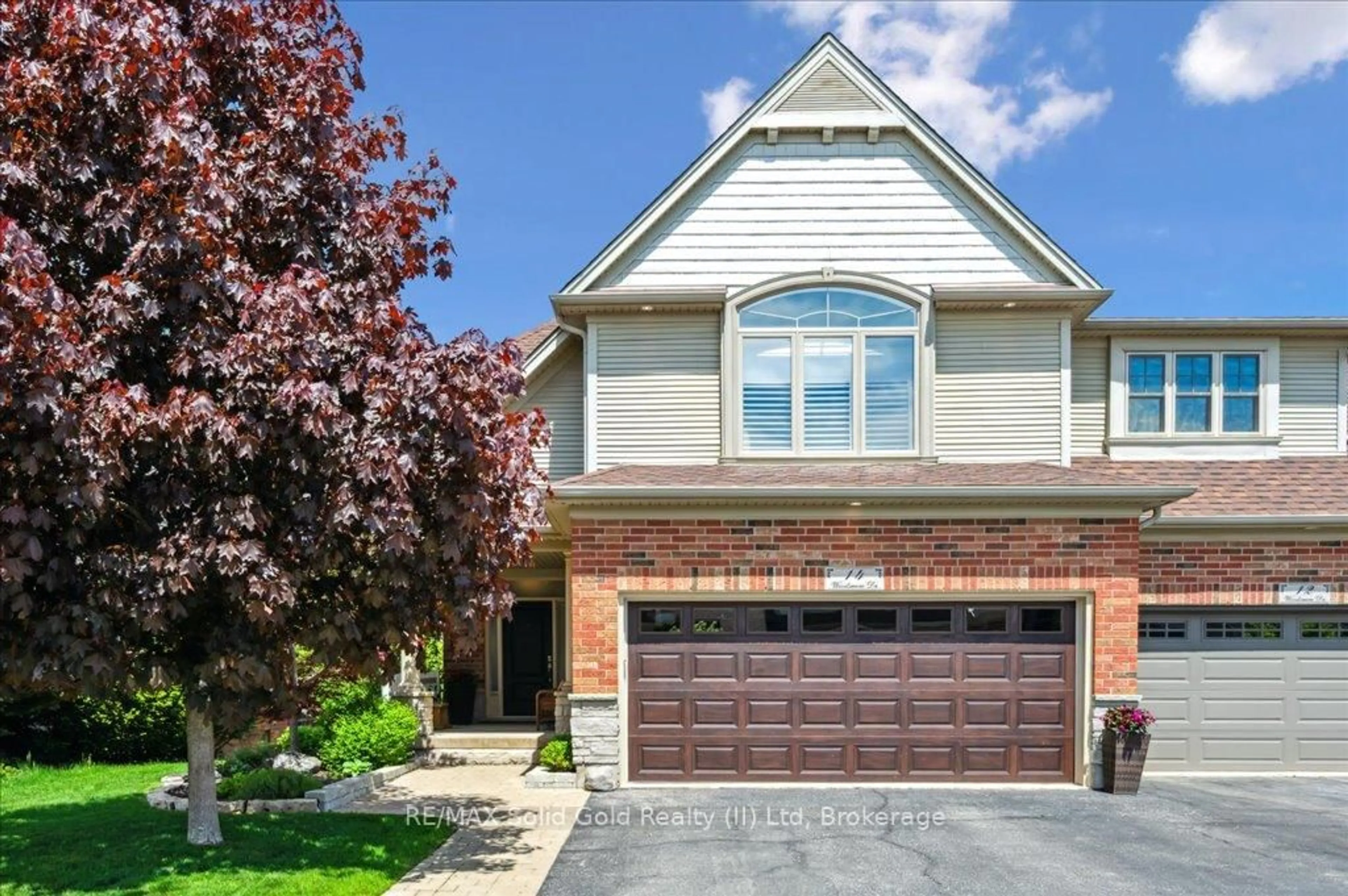 Home with brick exterior material, street for 14 Woodsmere Dr, Kitchener Ontario N2P 2X1