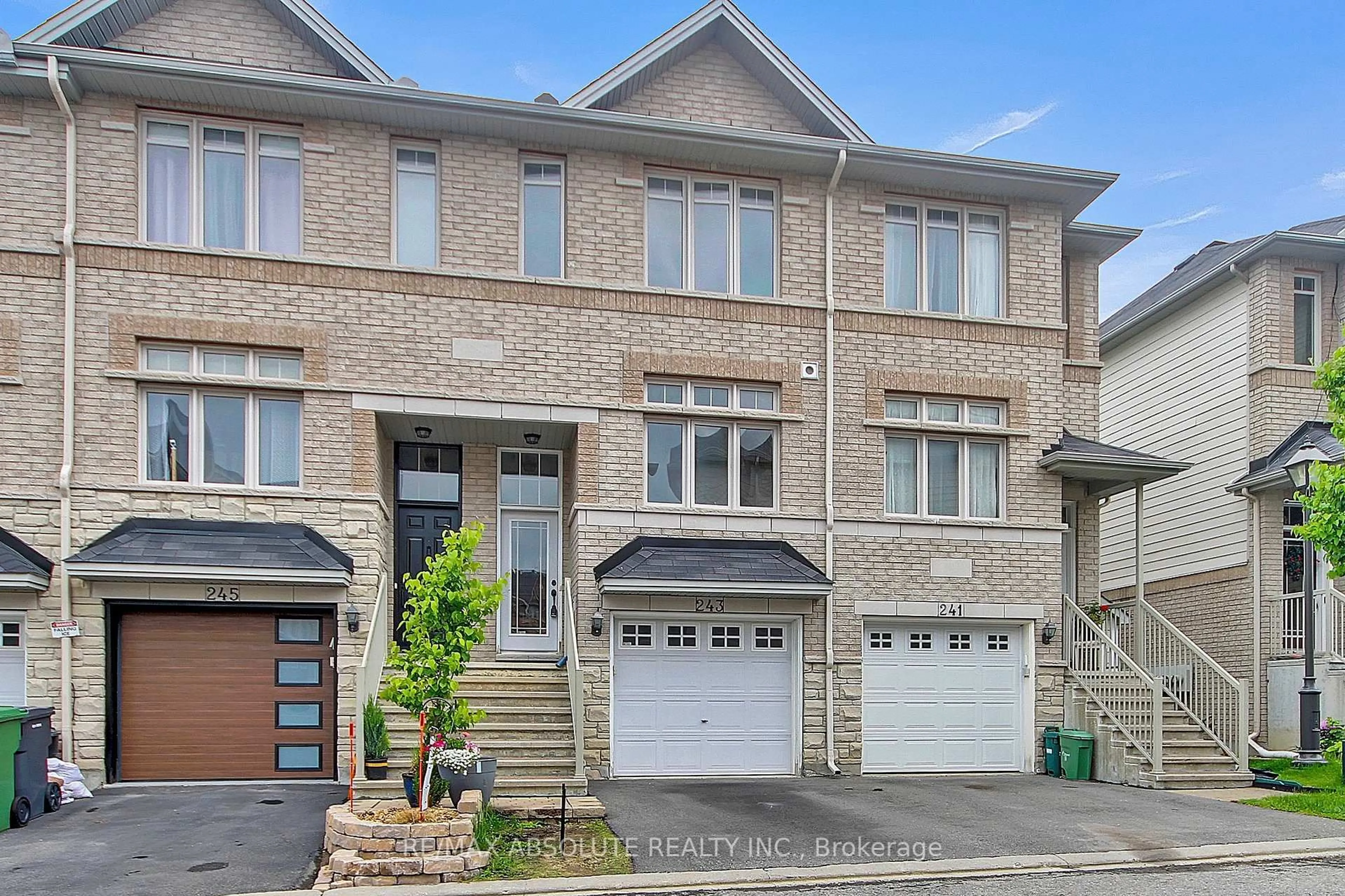 Home with brick exterior material, street for 243 Stroget Private, Ottawa Ontario K2E 0A9