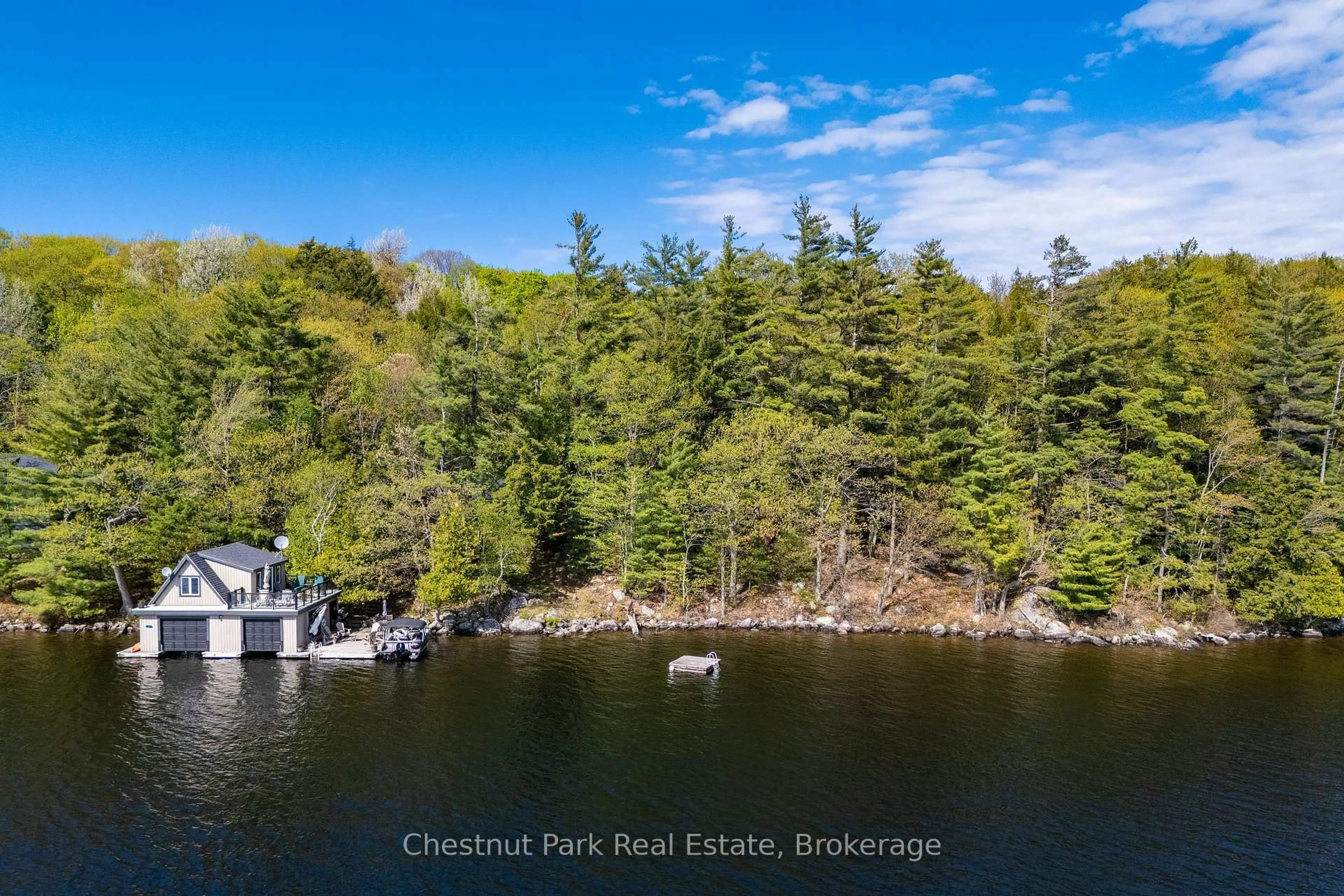 A pic from outside/outdoor area/front of a property/back of a property/a pic from drone, water/lake/river/ocean view for 57 Mazengah R52, Minett N/A, Muskoka Lakes Ontario P0B 1J0