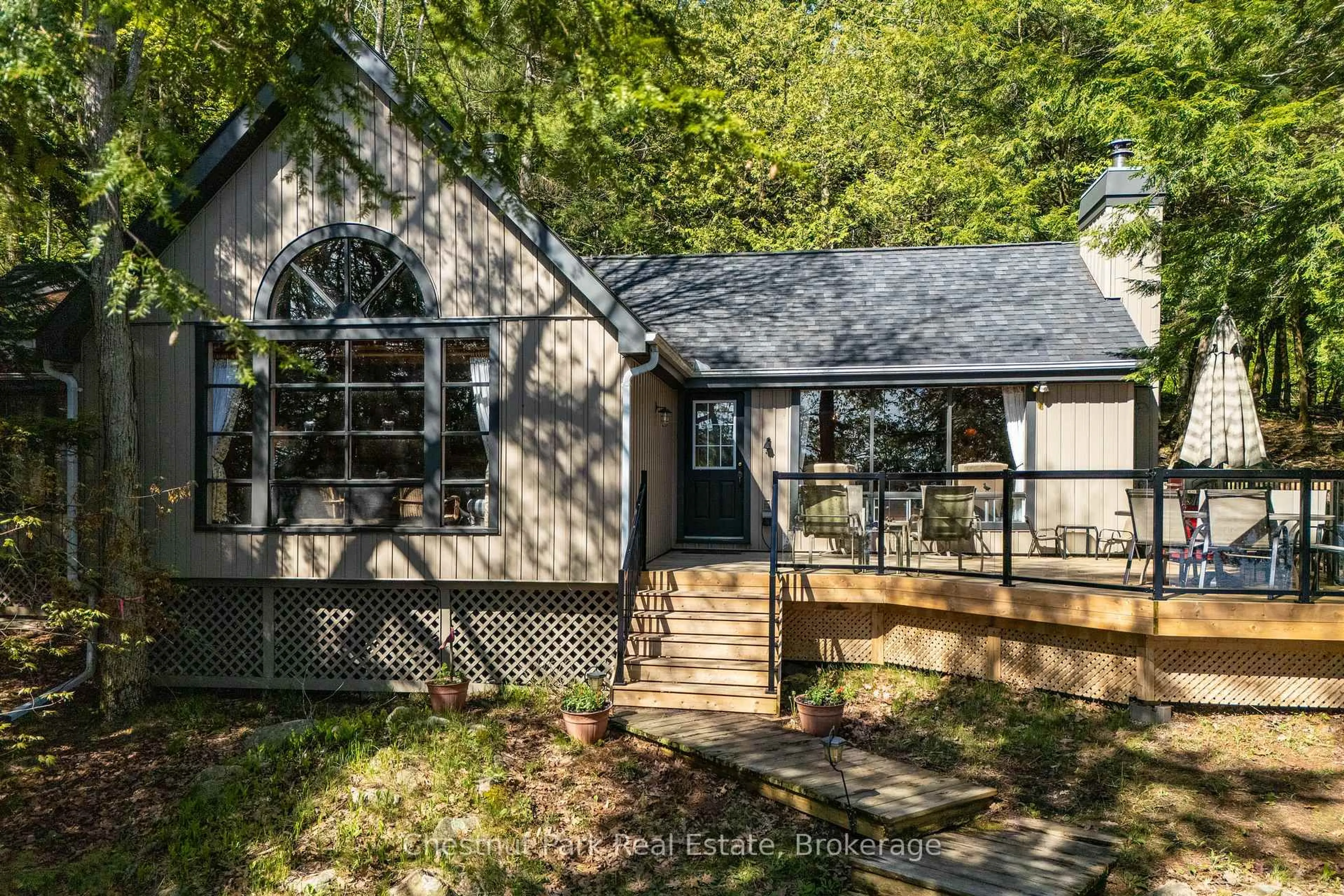 Home with vinyl exterior material, street for 57 Mazengah R52, Minett N/A, Muskoka Lakes Ontario P0B 1J0