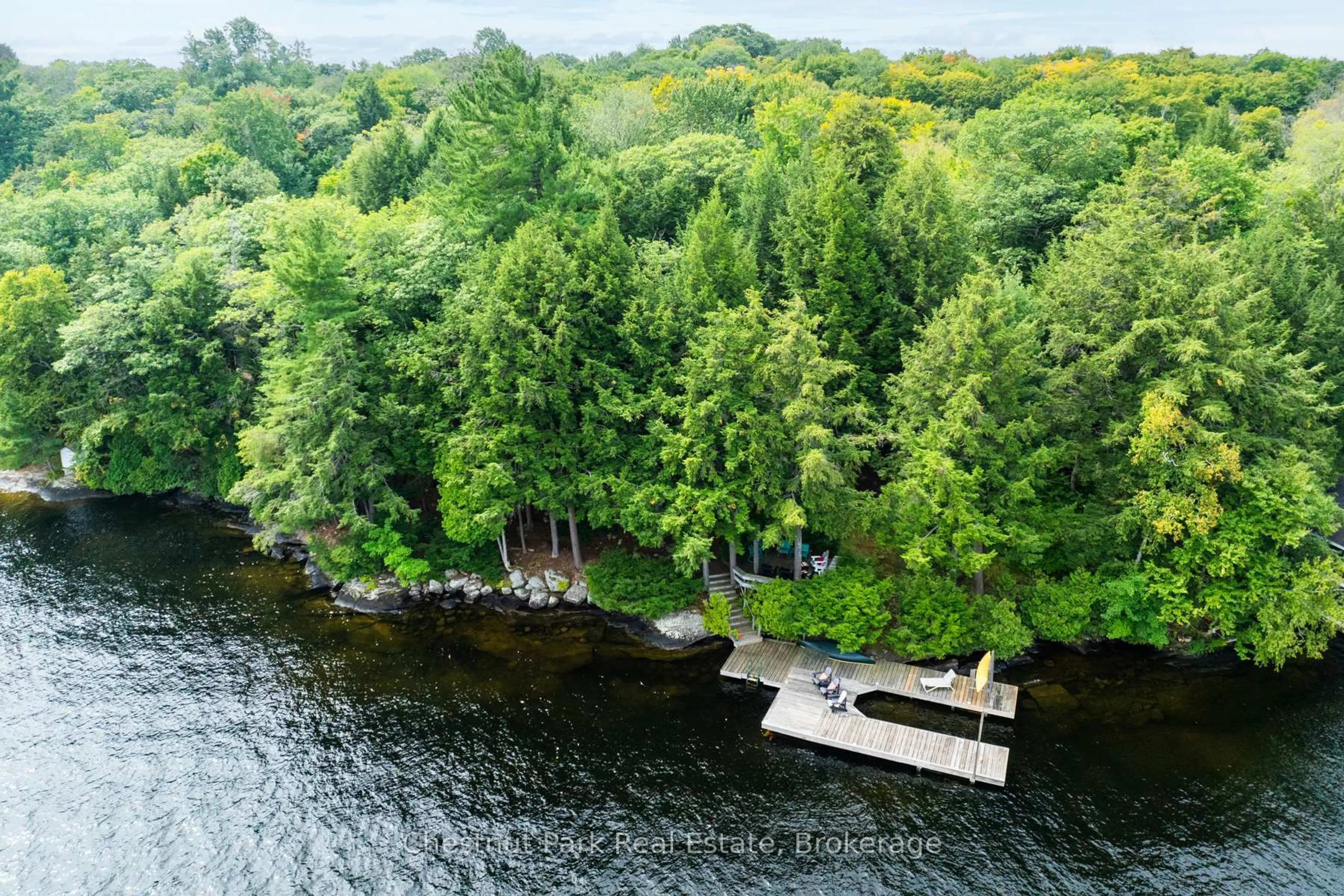 A pic from outside/outdoor area/front of a property/back of a property/a pic from drone, water/lake/river/ocean view for 1029 Ham Rd #2, Muskoka Lakes Ontario P0C 1A0