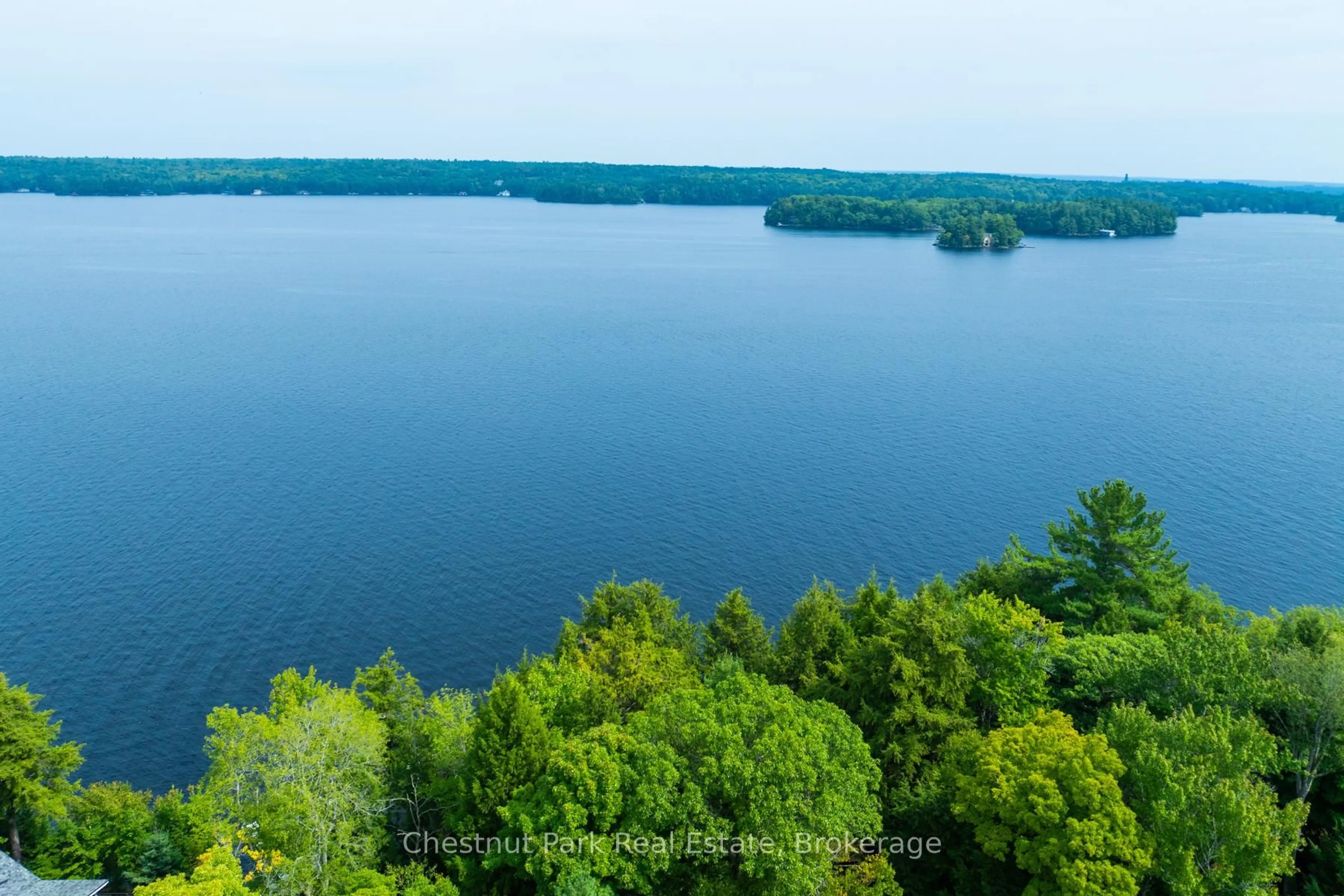 A pic from outside/outdoor area/front of a property/back of a property/a pic from drone, water/lake/river/ocean view for 1029 Ham Rd #2, Muskoka Lakes Ontario P0C 1A0