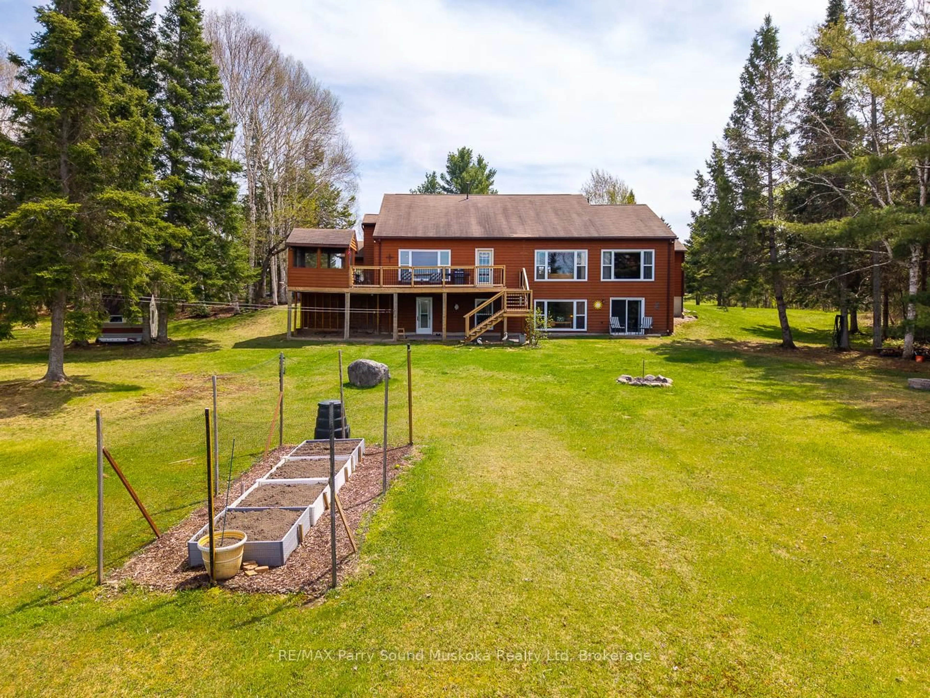 A pic from outside/outdoor area/front of a property/back of a property/a pic from drone, water/lake/river/ocean view for 258 Lakeside Tr, Magnetawan Ontario P0A 1P0