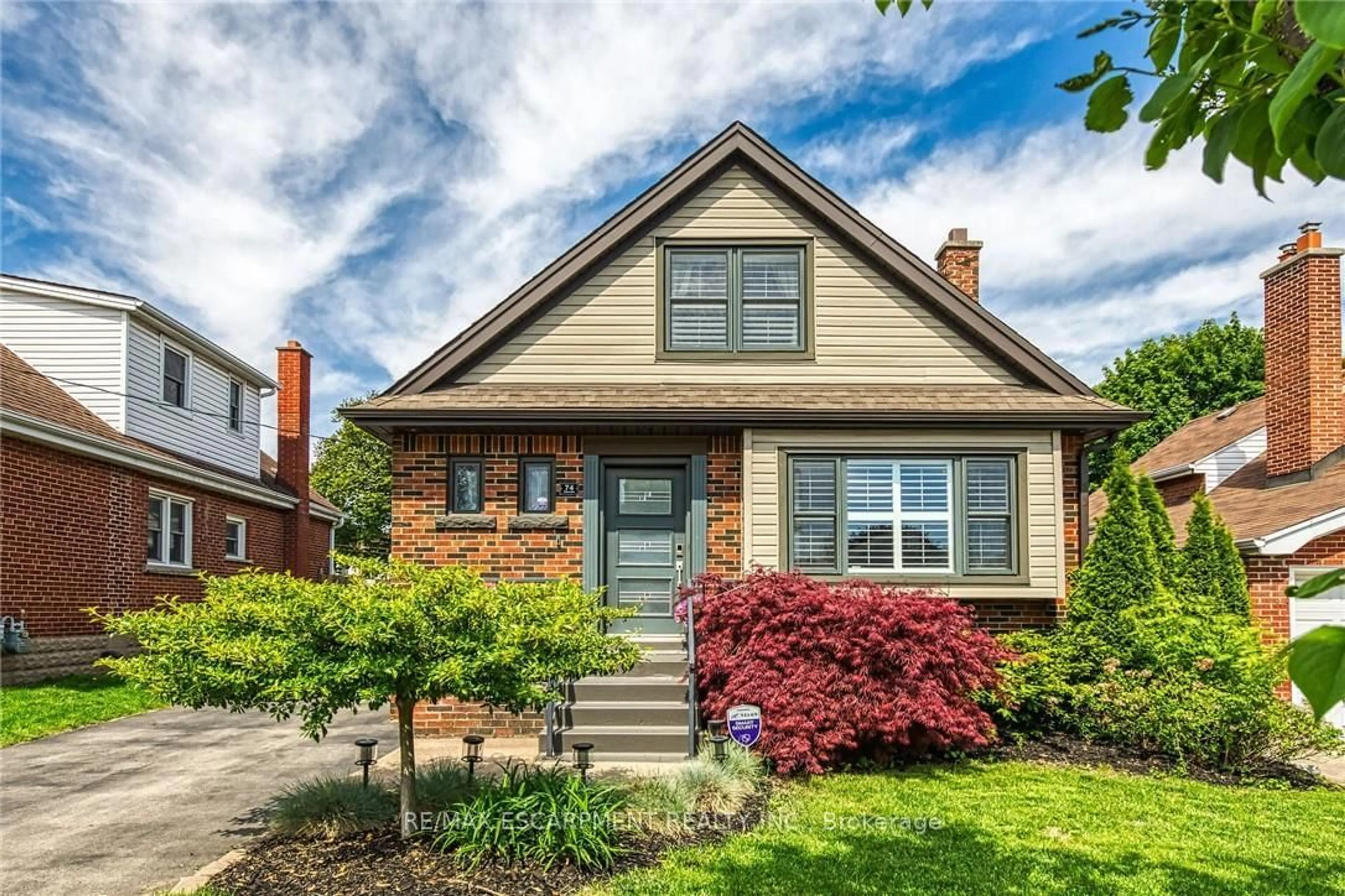 Home with brick exterior material, street for 74 Garside Ave, Hamilton Ontario L8K 2V8