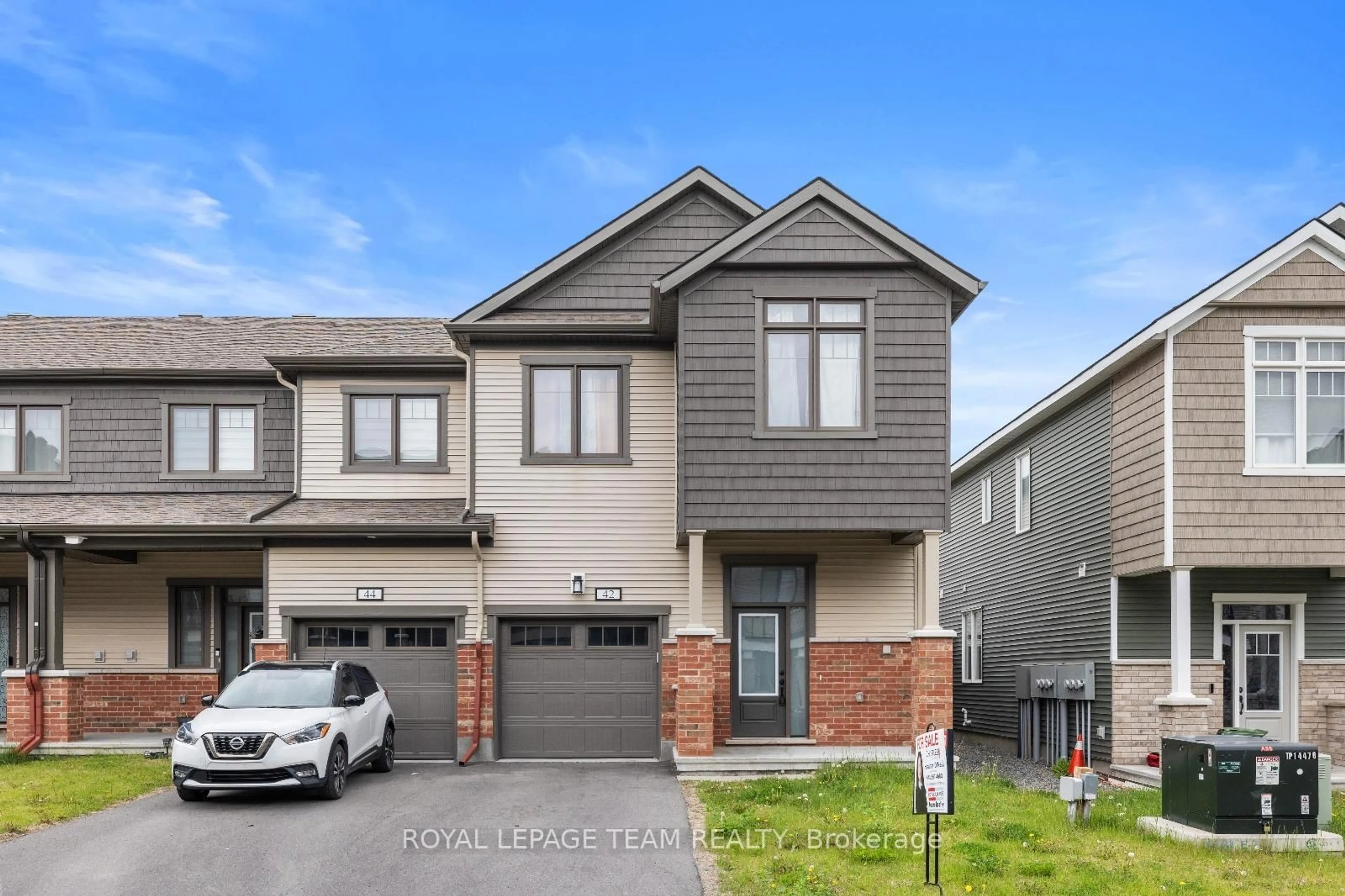 Home with brick exterior material, street for 42 Lentago Ave, Ottawa Ontario K2J 7A2