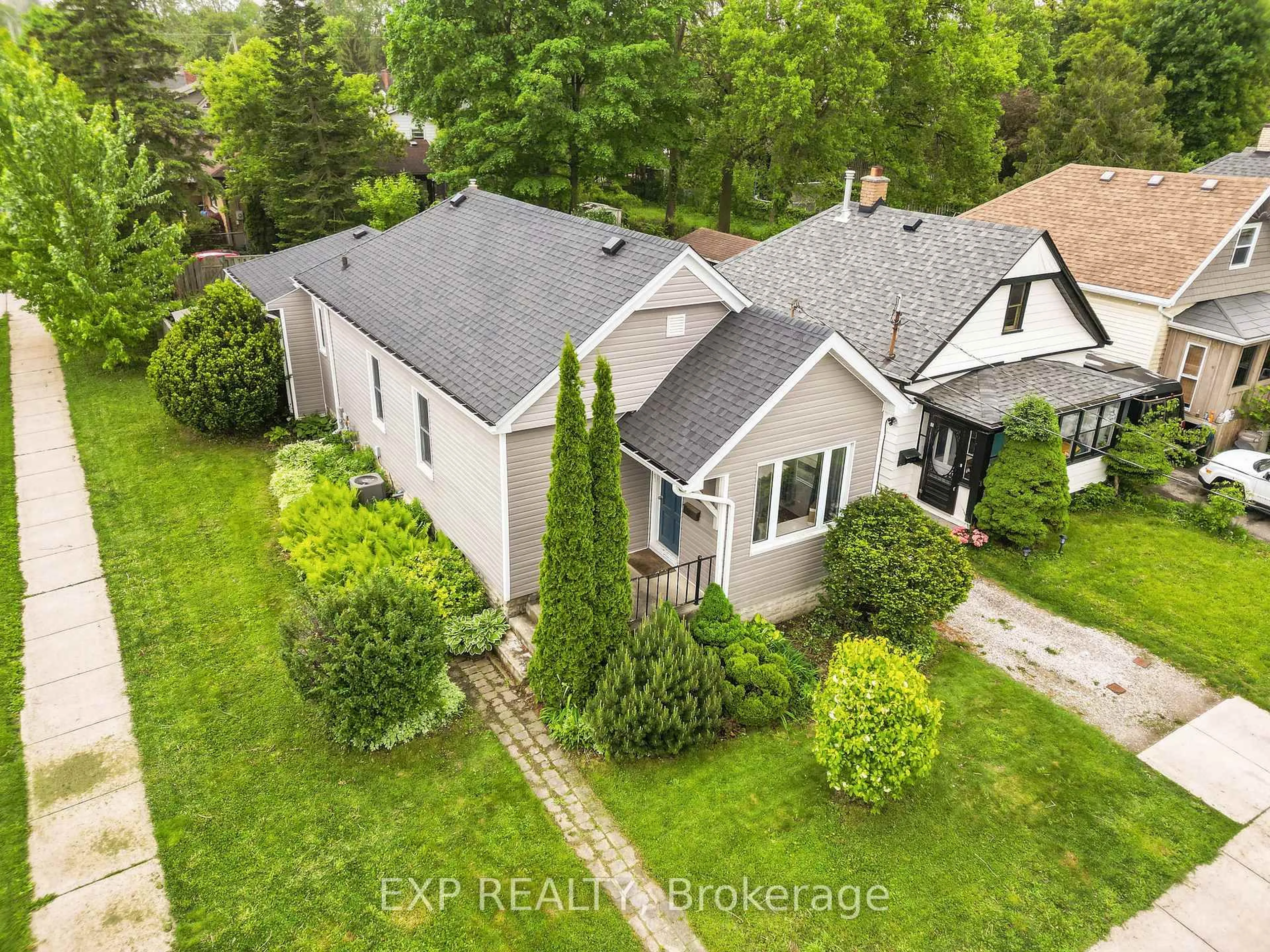 A pic from outside/outdoor area/front of a property/back of a property/a pic from drone, street for 87 EMERY St, London South Ontario N6C 2C7