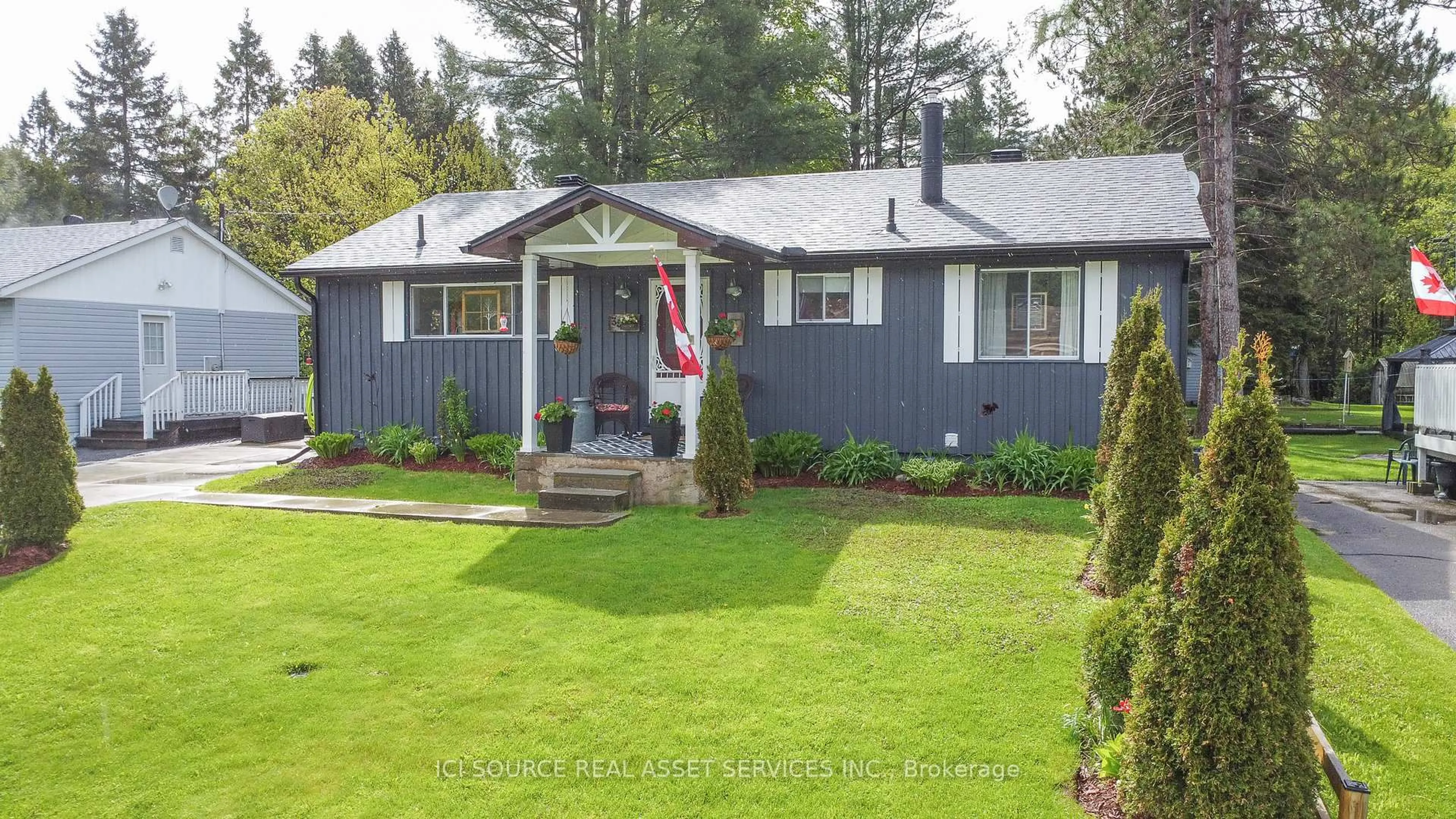 A pic from outside/outdoor area/front of a property/back of a property/a pic from drone, street for 35 Hemlock St, Highlands East Ontario K0L 1M0