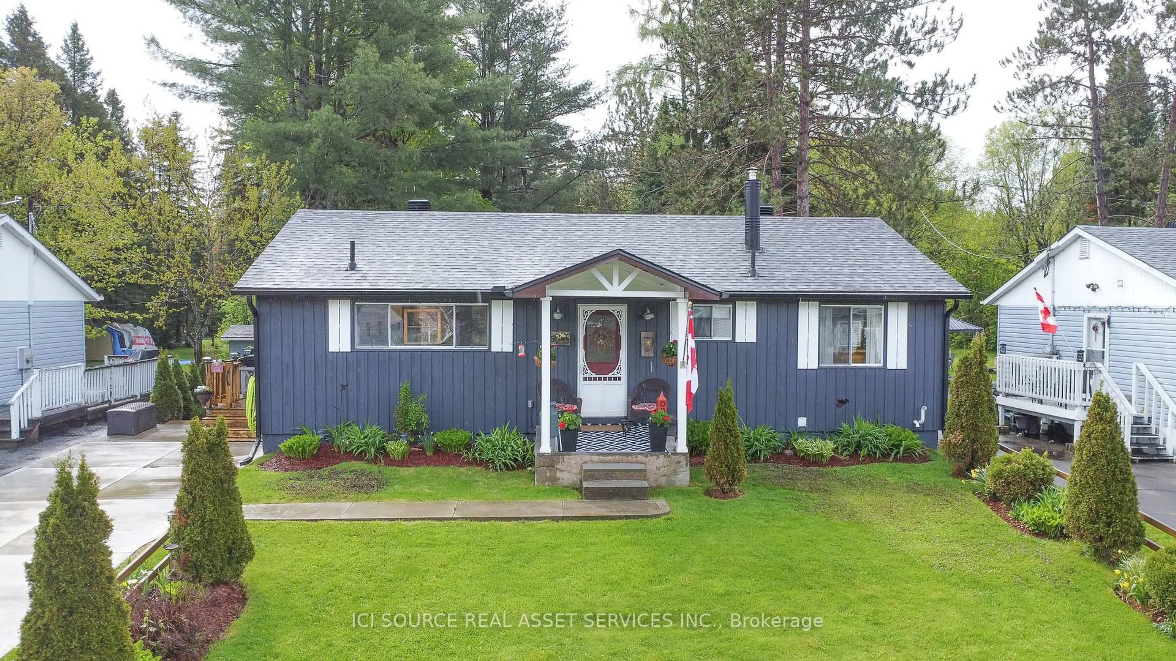 Home with vinyl exterior material, street for 35 Hemlock St, Highlands East Ontario K0L 1M0