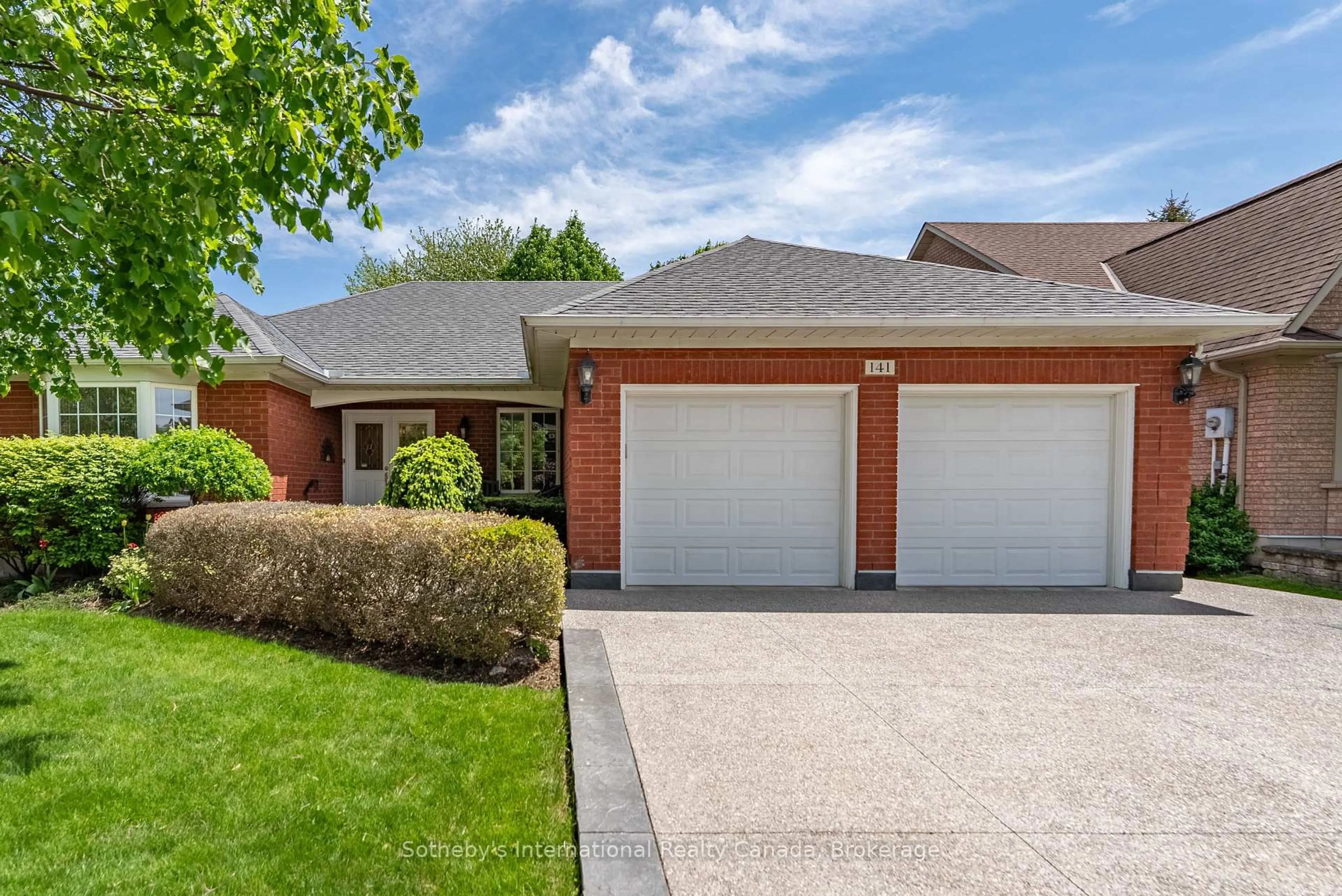 Home with brick exterior material, street for 141 Springfield Blvd, Hamilton Ontario L9K 1H8