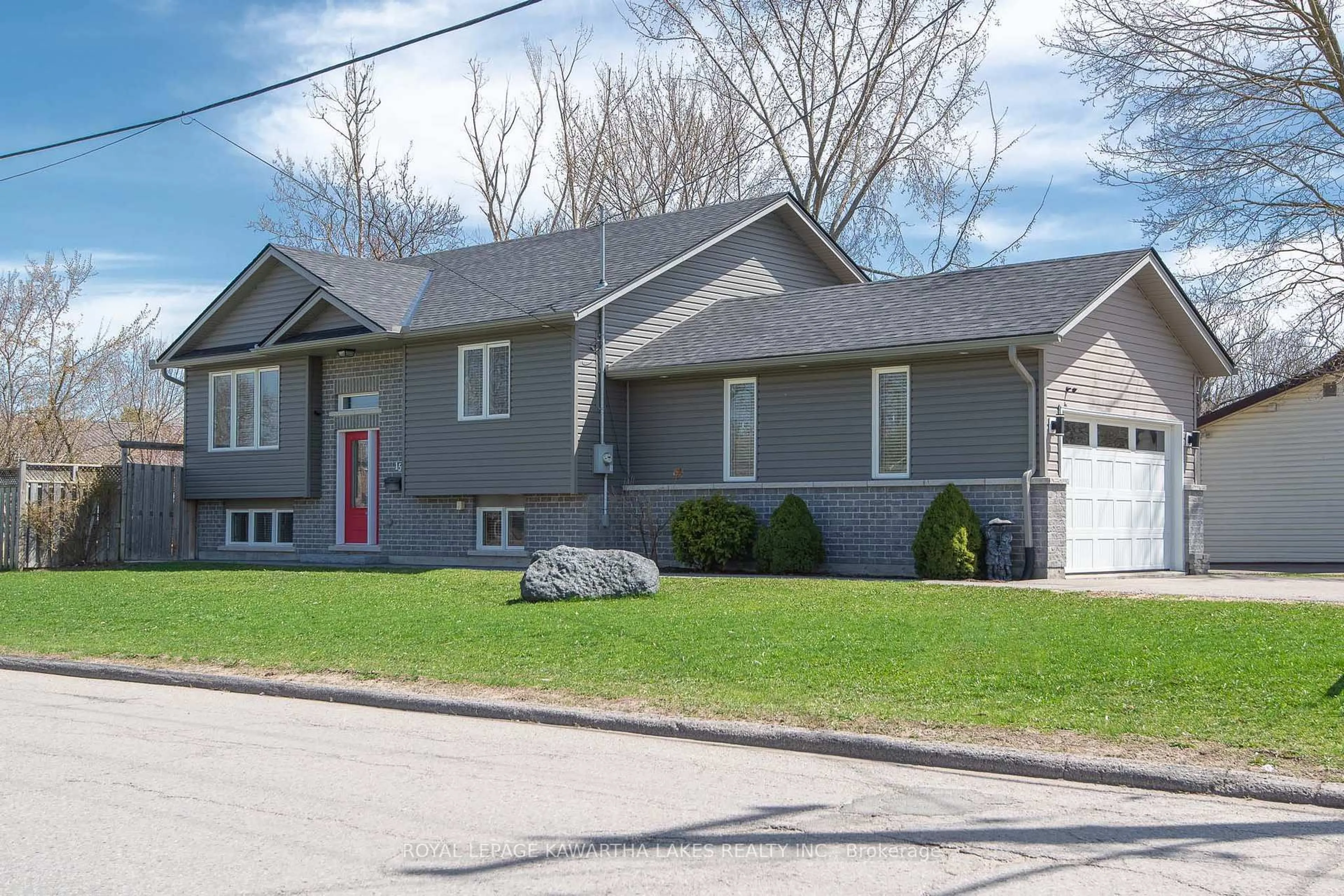 Home with vinyl exterior material, street for 15 Durham St, Kawartha Lakes Ontario K9V 5R5