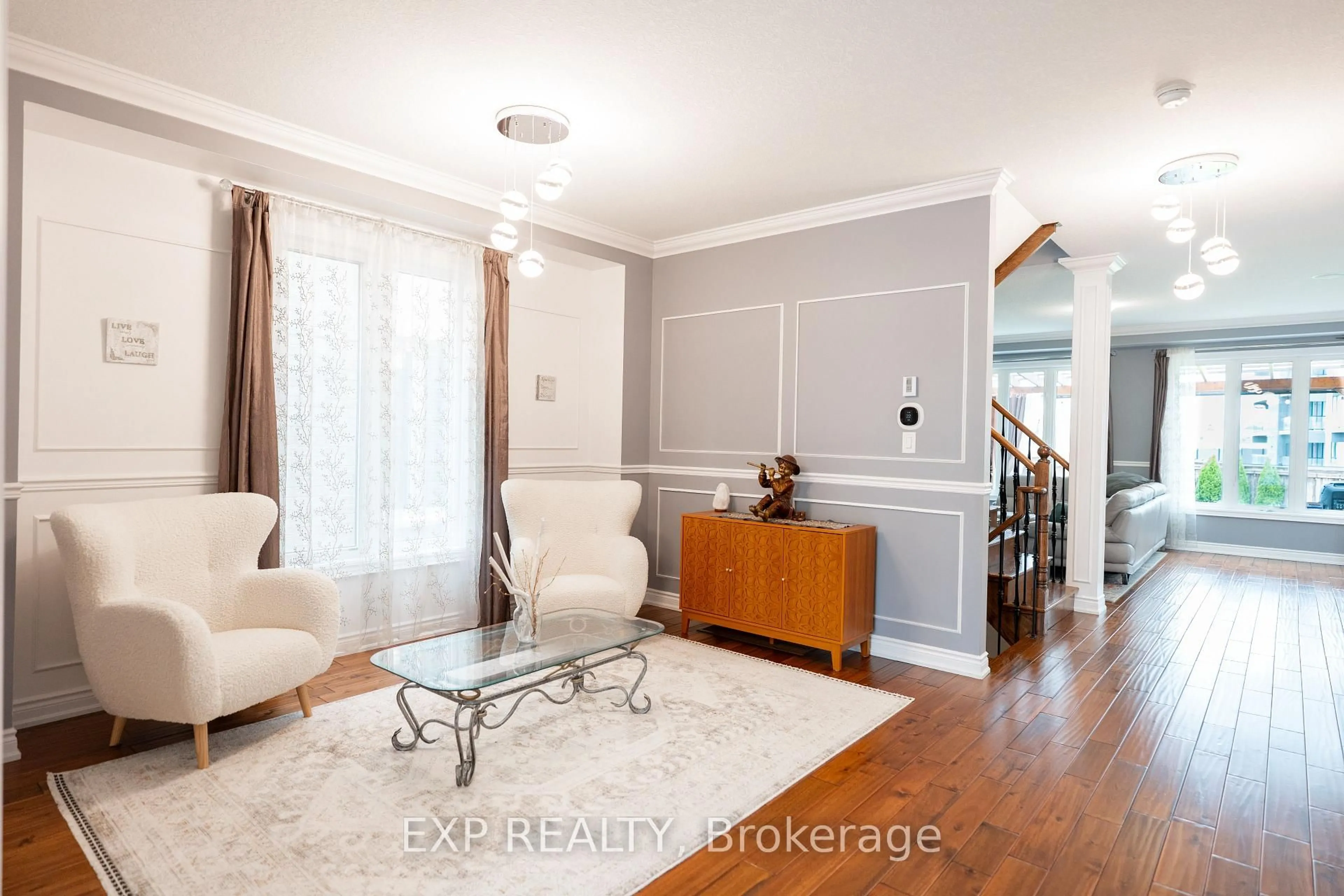 Living room with furniture, wood/laminate floor for 8375 ELDERBERRY Dr, Niagara Falls Ontario L2H 0K6