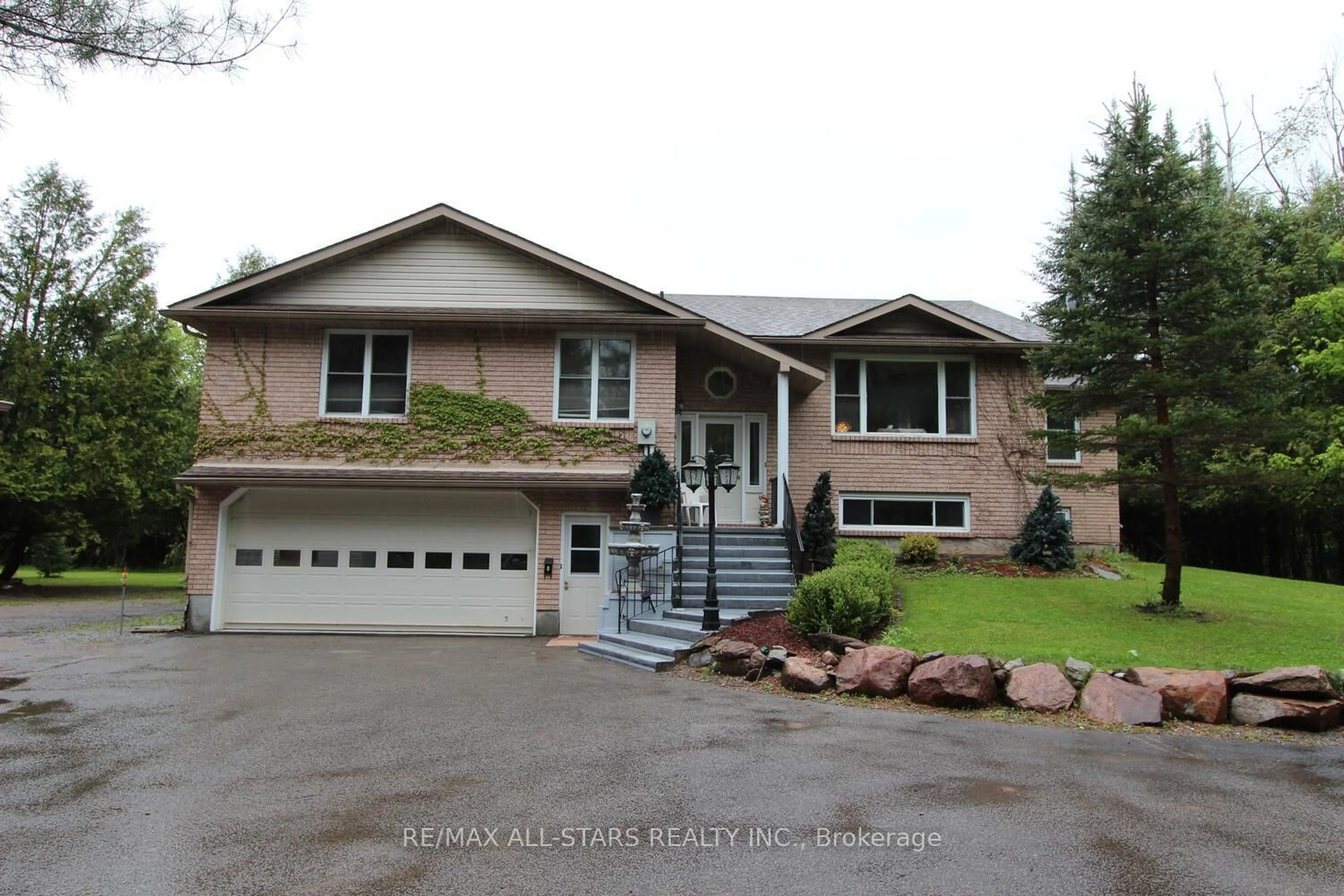 Home with vinyl exterior material, street for 33 Tates Bay Rd, Trent Lakes Ontario K0M 1A0