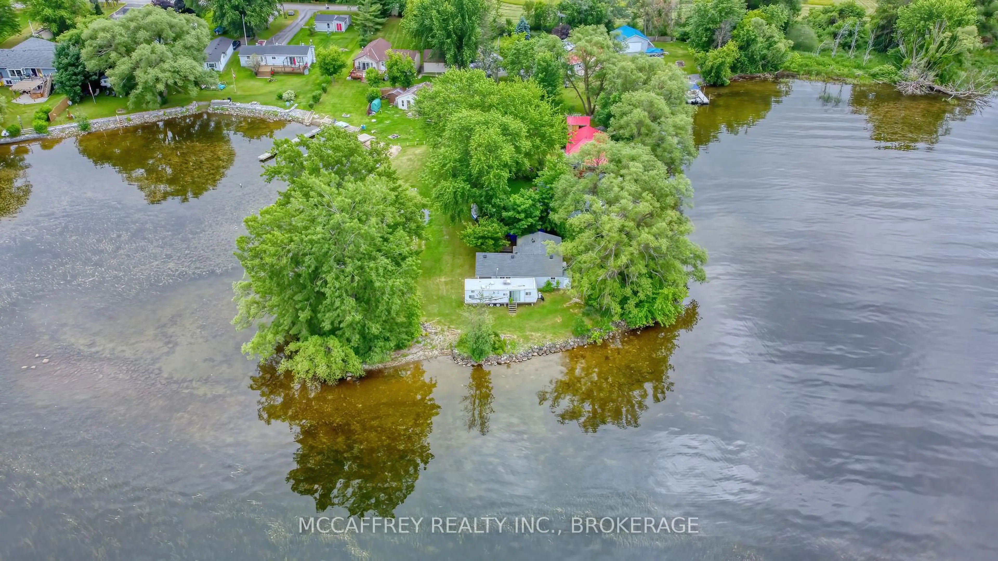 A pic from outside/outdoor area/front of a property/back of a property/a pic from drone, water/lake/river/ocean view for 94 WILLOW POINT Lane, Napanee Ontario K7R 3K7