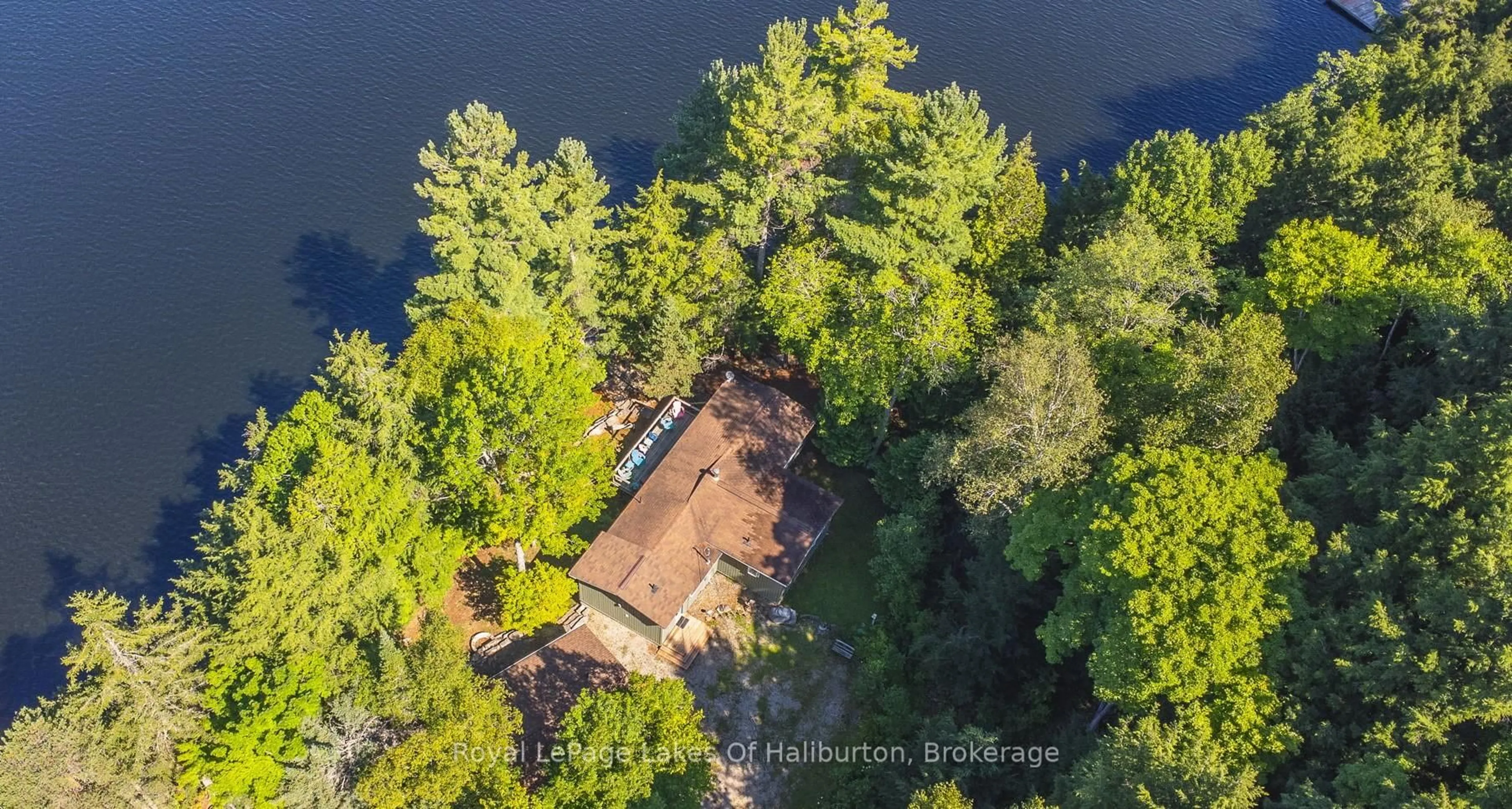 A pic from outside/outdoor area/front of a property/back of a property/a pic from drone, water/lake/river/ocean view for 1358 Kushog Lake Rd, Algonquin Highlands Ontario K0M 1S0