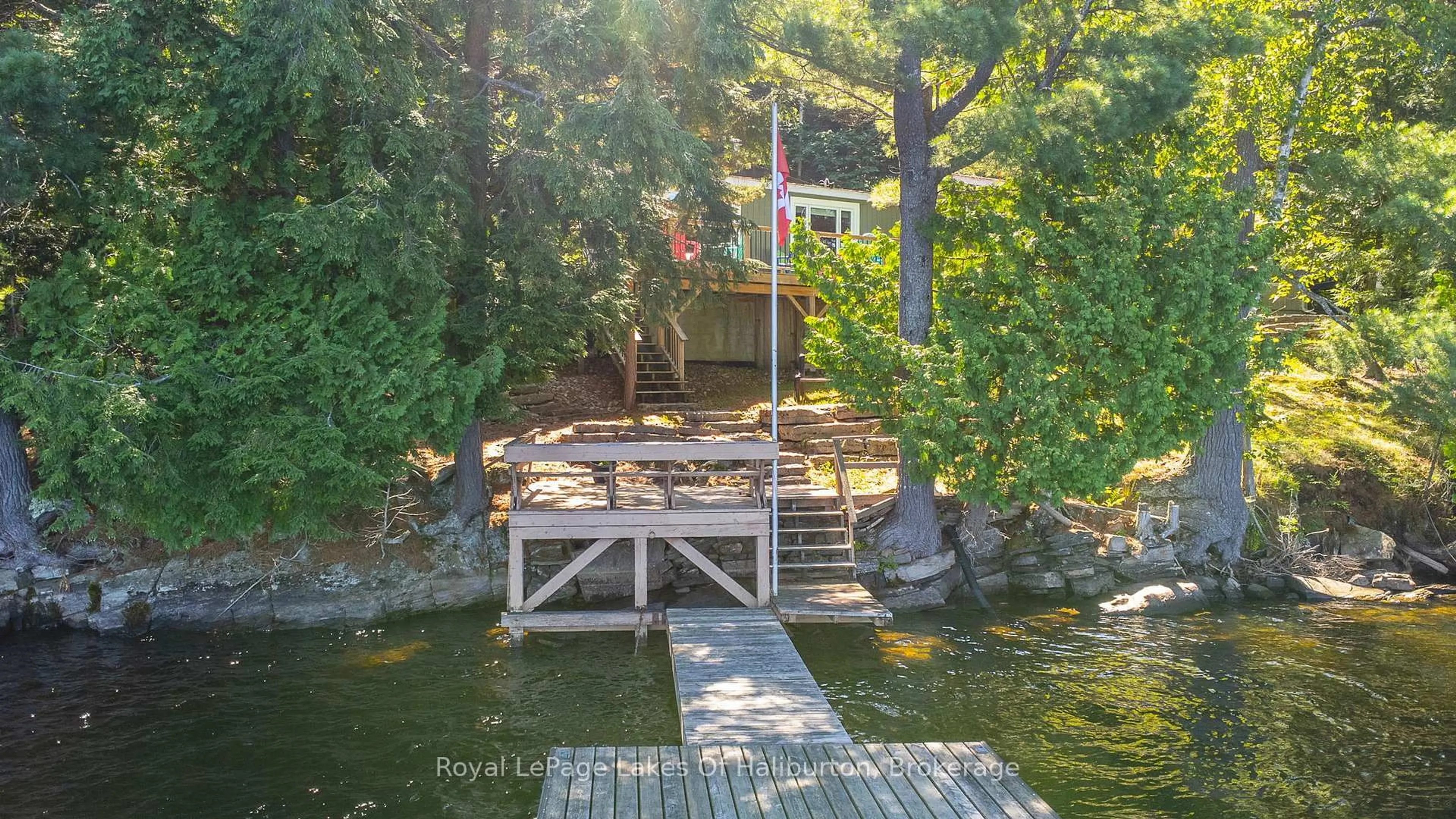 A pic from outside/outdoor area/front of a property/back of a property/a pic from drone, water/lake/river/ocean view for 1358 Kushog Lake Rd, Algonquin Highlands Ontario K0M 1S0