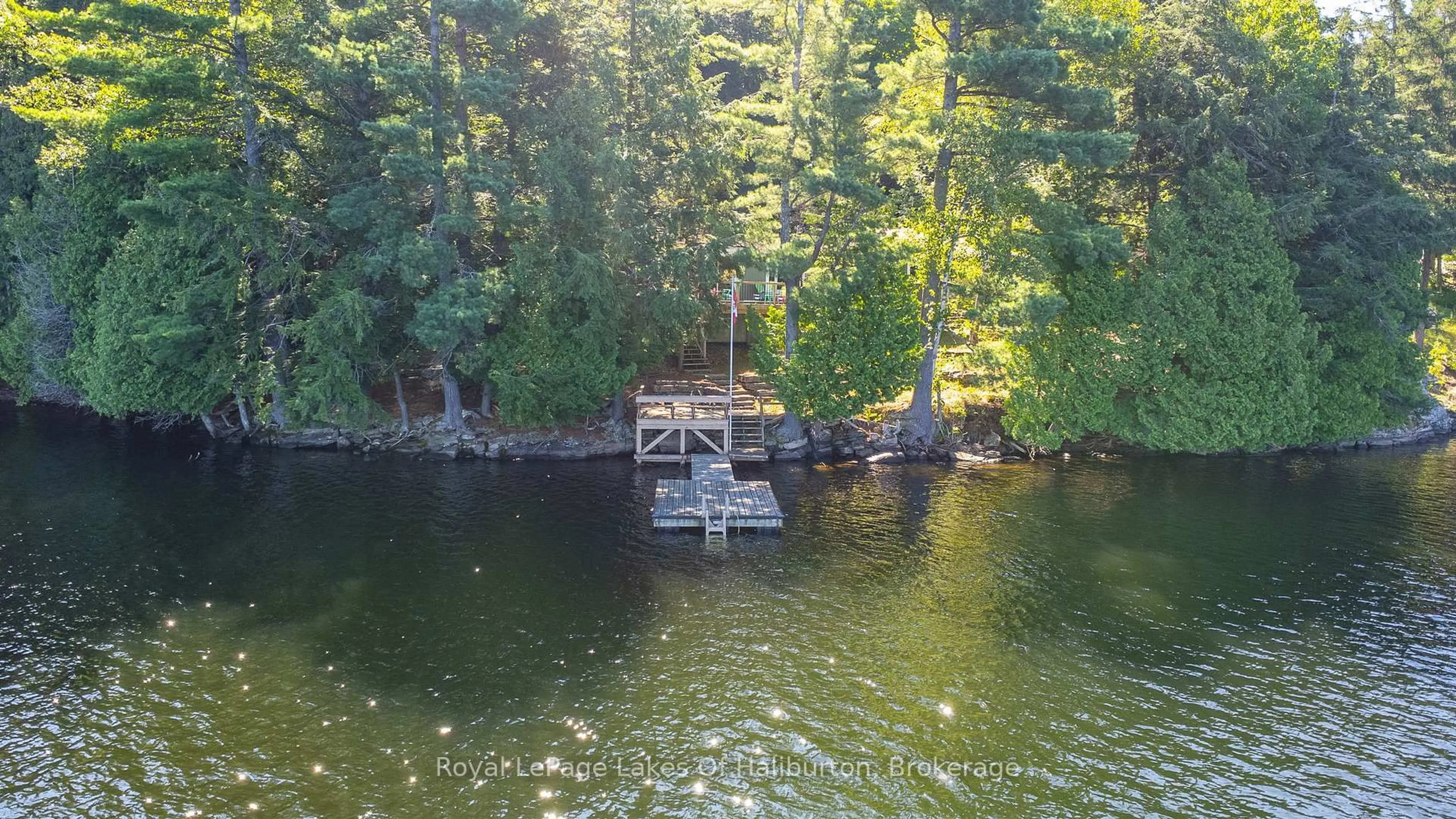 A pic from outside/outdoor area/front of a property/back of a property/a pic from drone, water/lake/river/ocean view for 1358 Kushog Lake Rd, Algonquin Highlands Ontario K0M 1S0